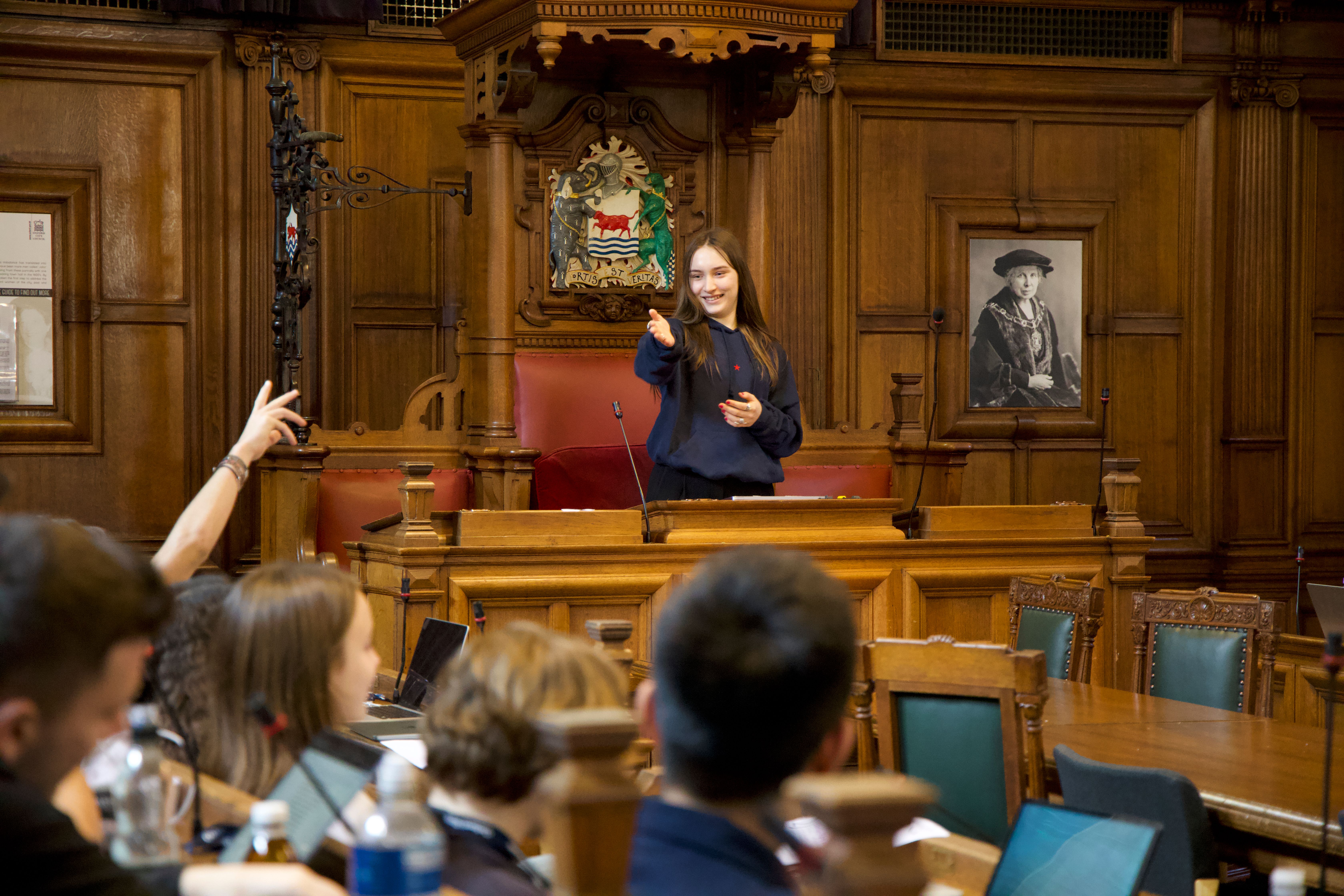 Student giving a speech in Oxford Courtroom