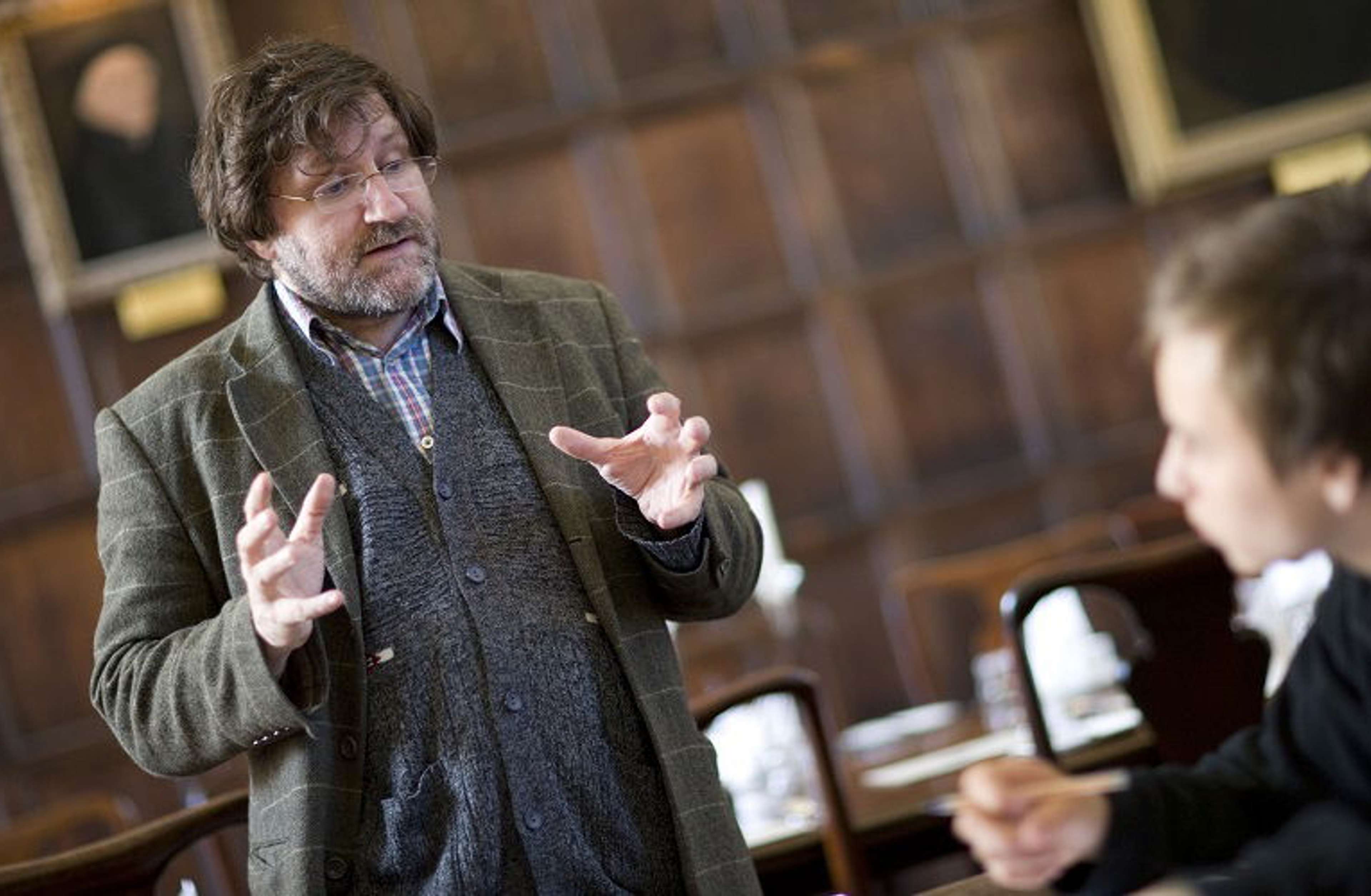 Teacher speaking to students