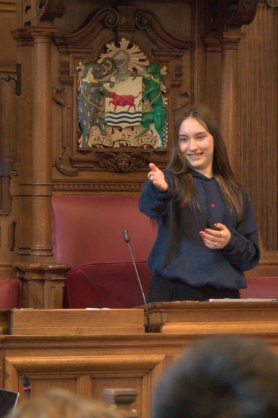 Two students speaking together outside