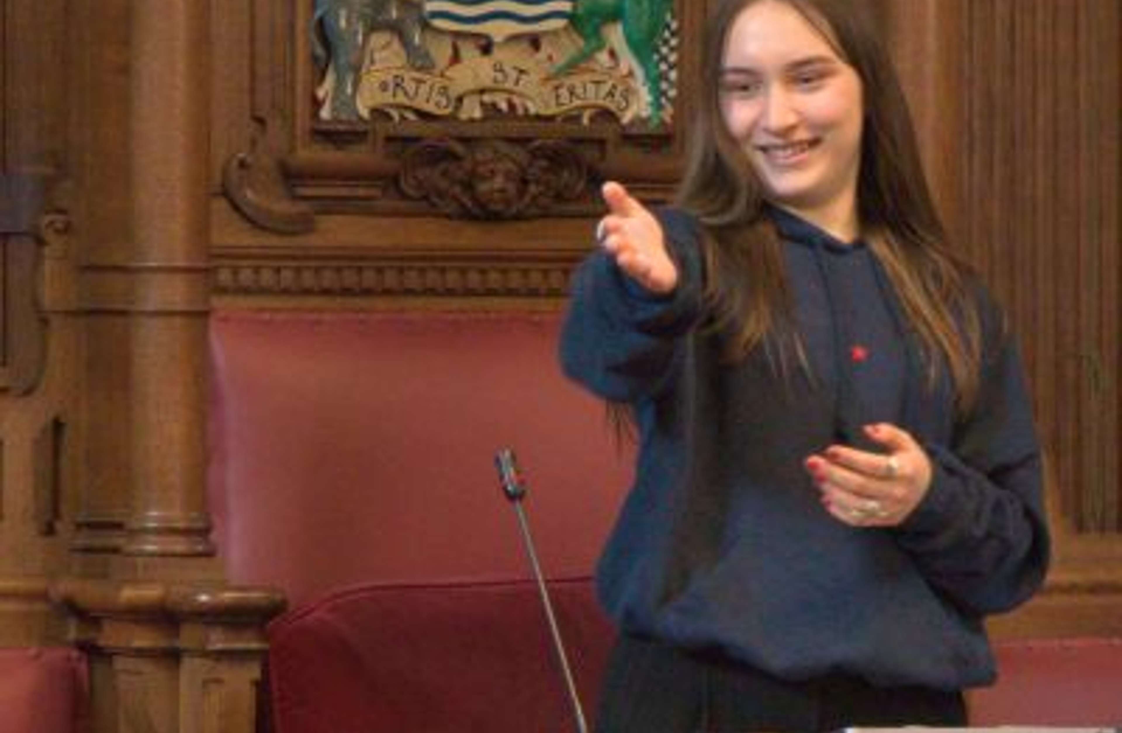 Two students speaking together outside