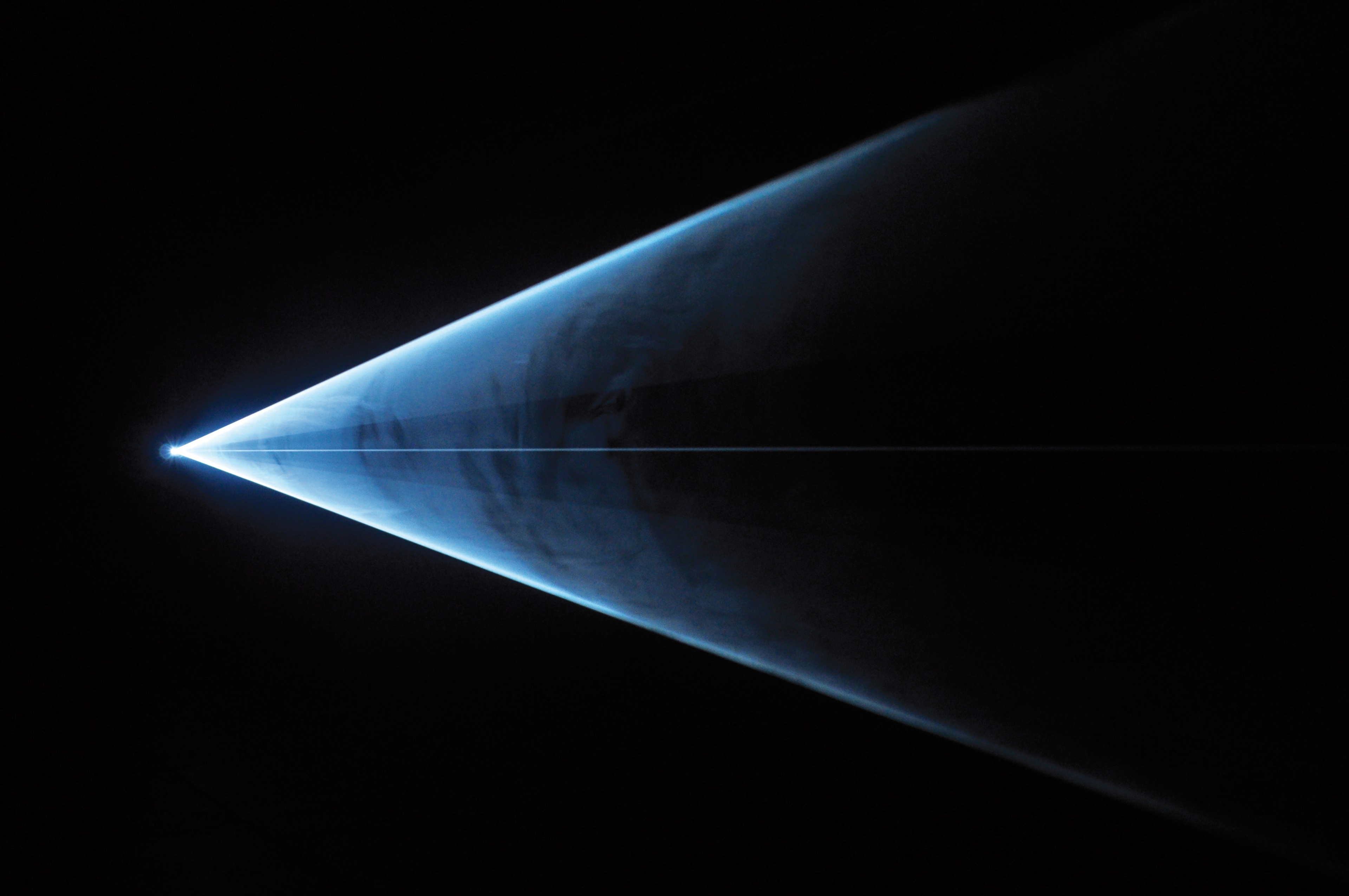 Installation view of Anthony McCall: Drawing With Light, Te Pātaka Toi Adam Art Gallery, Te Herenga Waka–Victoria University Wellington, 2010