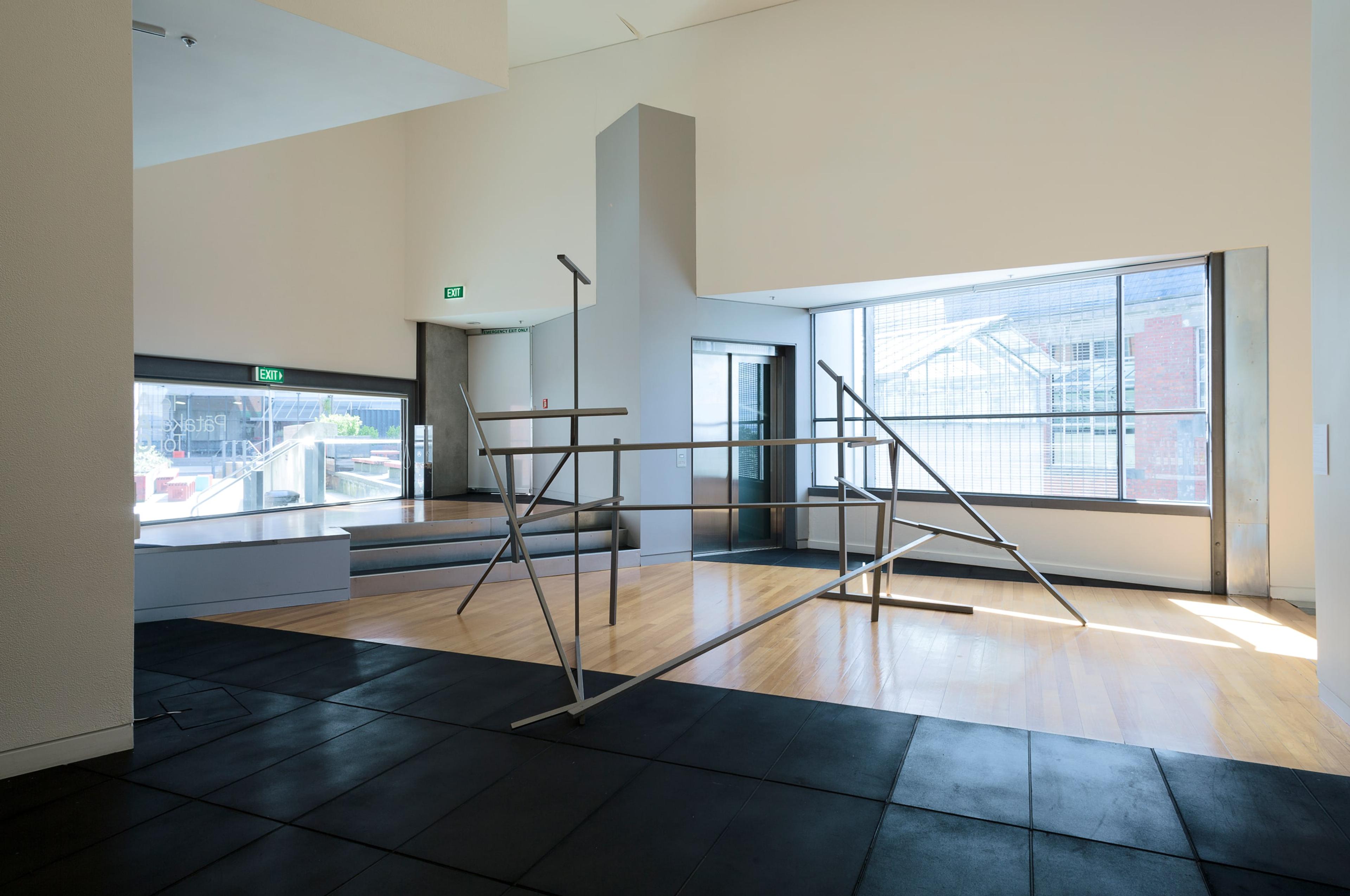 Installation view of John Panting: Spatial Constructions at the Adam Art Gallery, showing 5.07 (Untitled III), 1972–73, steel, 290 x 455 x 244cm. Collection of Auckland Art Gallery Toi o Tāmaki, purchased 1976. Photo: Shaun Waugh