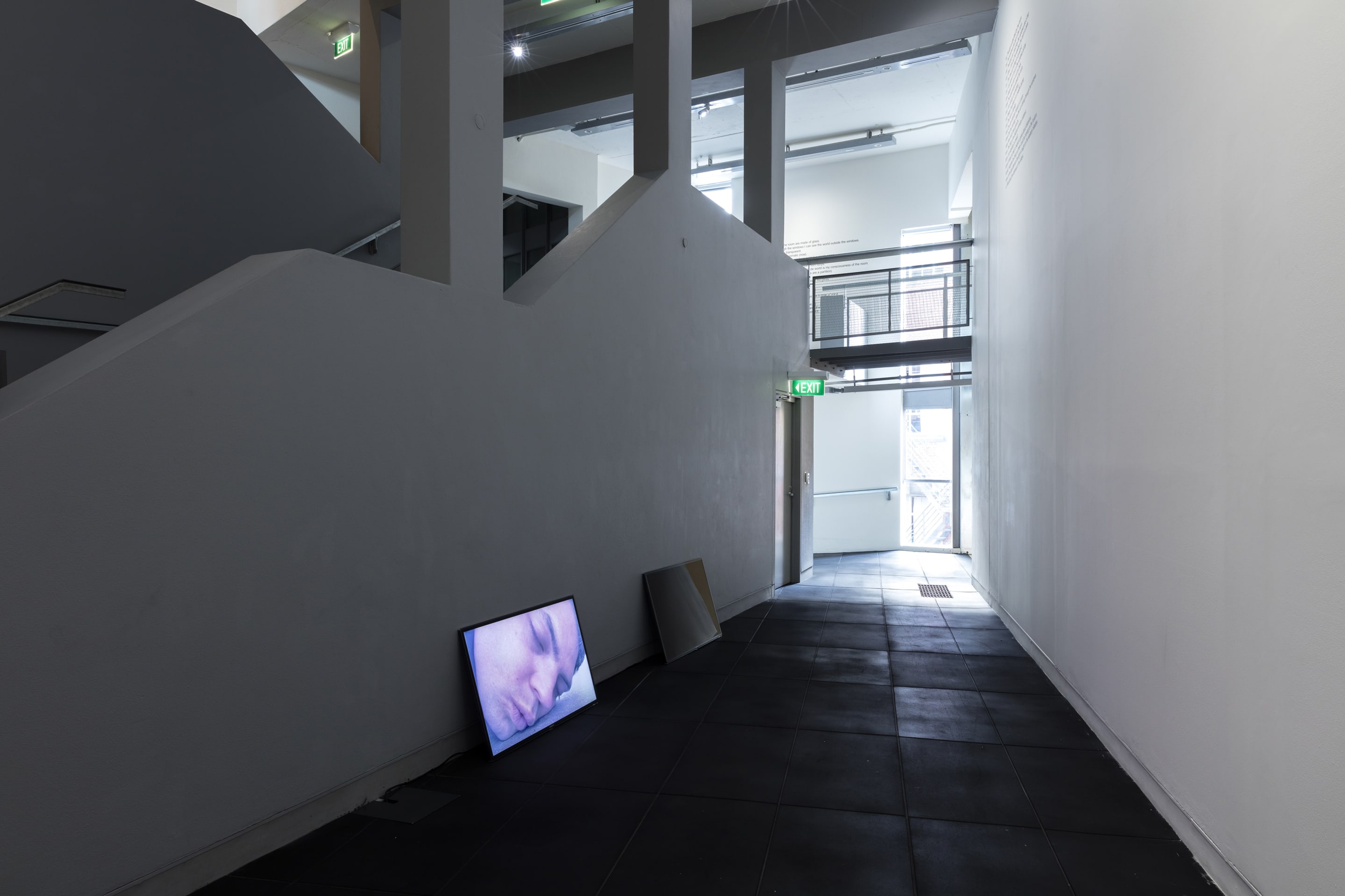 Campbell Patterson, Untitled (Sing), 2014, two-channel HD video, 59 mins, 58 secs, courtesy of Michael Lett, Auckland. In the exhibition Inhabiting Space at Adam Art Gallery Te Pātaka Toi, Victoria University of Wellington (photo: Shaun Waugh)