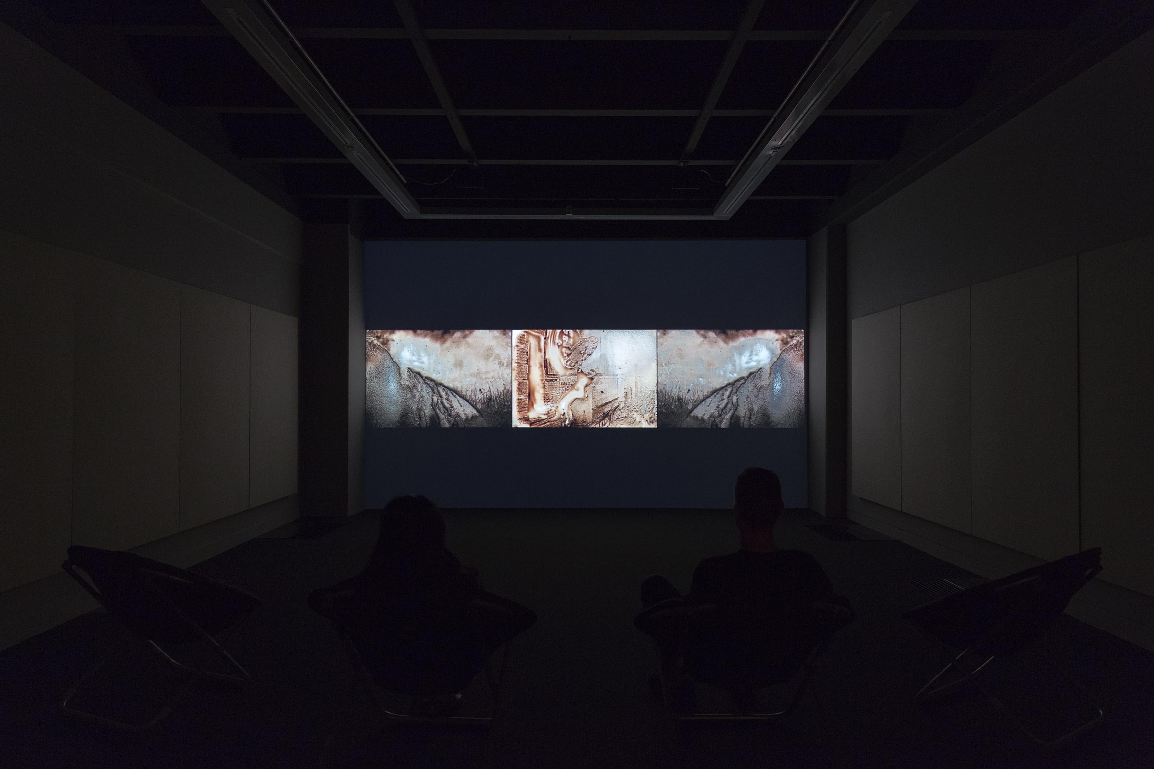 Phil Solomon, installation view of American Falls, 2000-12. Digital video, altered archival footage, colour, 5.1 and stereo sound, 55mins. Commissioned by the Corcoran Gallery of Art, Washington, D.C. Courtesy of the artist. Photo: Shaun Waugh.