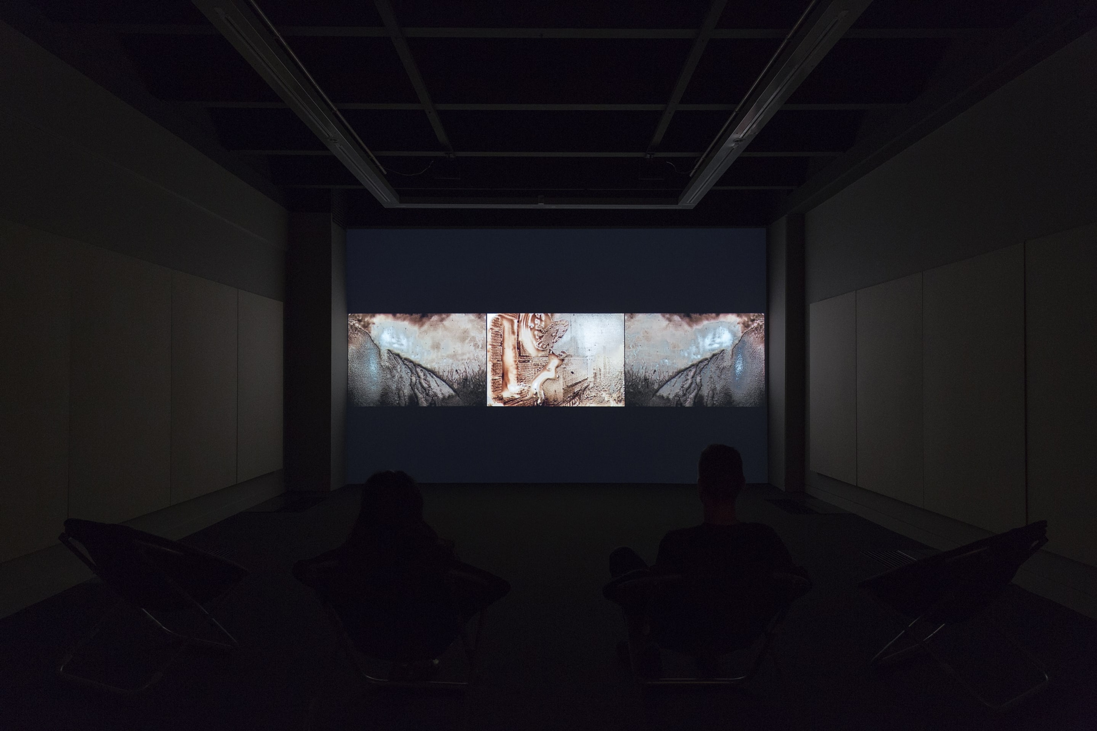 Phil Solomon, installation view of American Falls, 2000-12. Digital video, altered archival footage, colour, 5.1 and stereo sound, 55mins. Commissioned by the Corcoran Gallery of Art, Washington, D.C. Courtesy of the artist. Photo: Shaun Waugh.