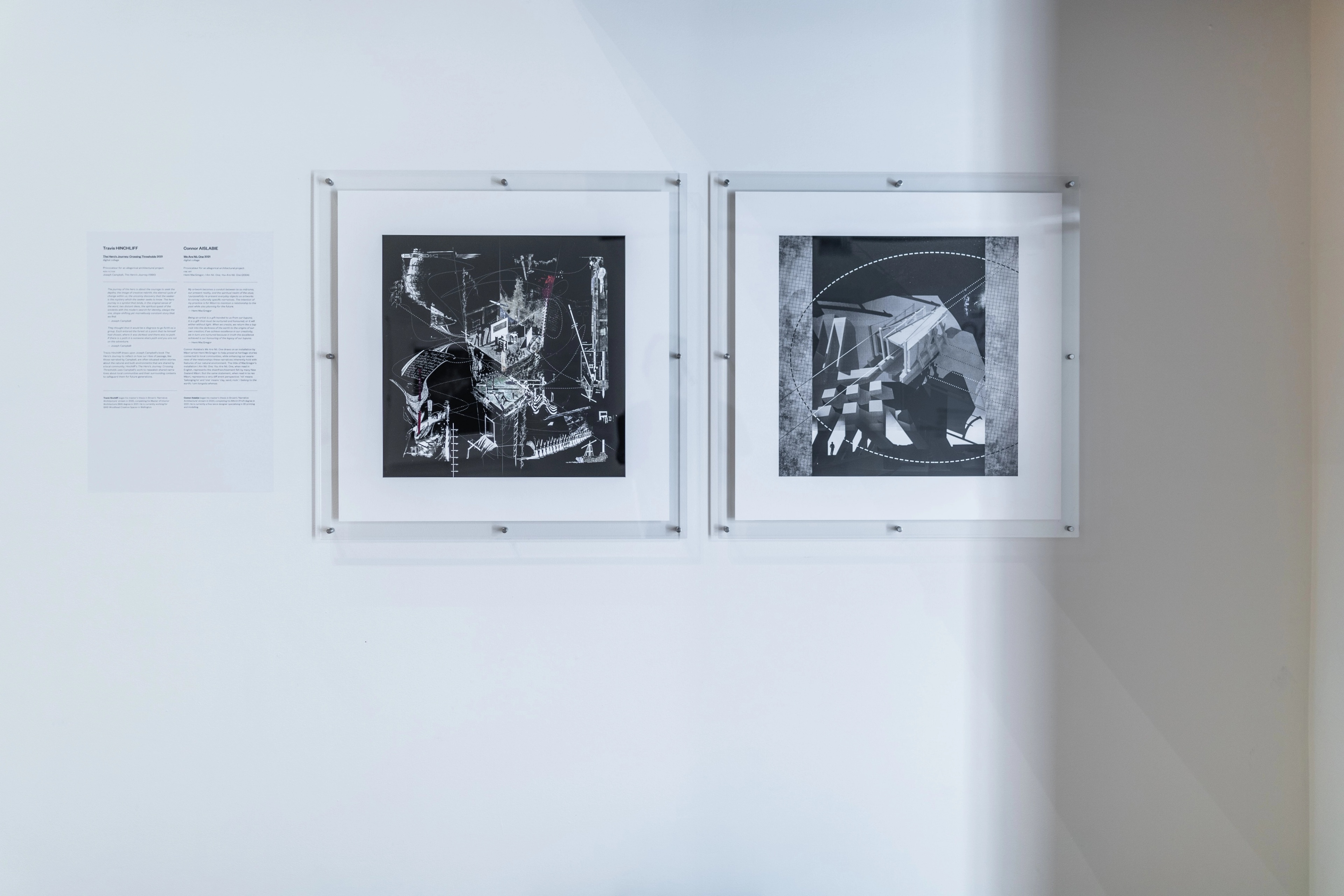 Straight on view of a gallery wall with text and square architectural images in perspex mounts. Daniel K. Brown 