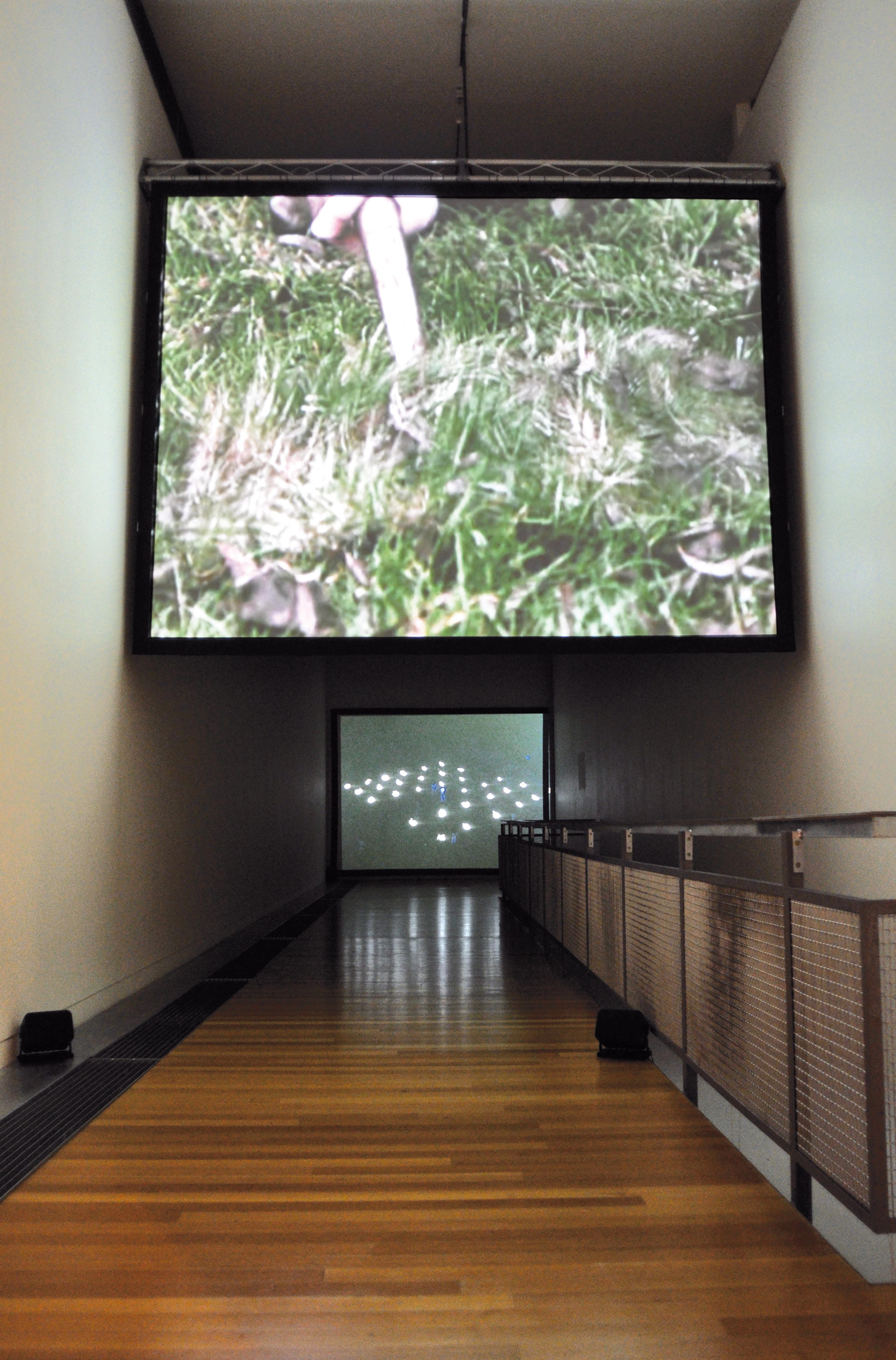 Installation view of Anthony McCall: Drawing With Light, Te Pātaka Toi Adam Art Gallery, Te Herenga Waka–Victoria University Wellington, 2010