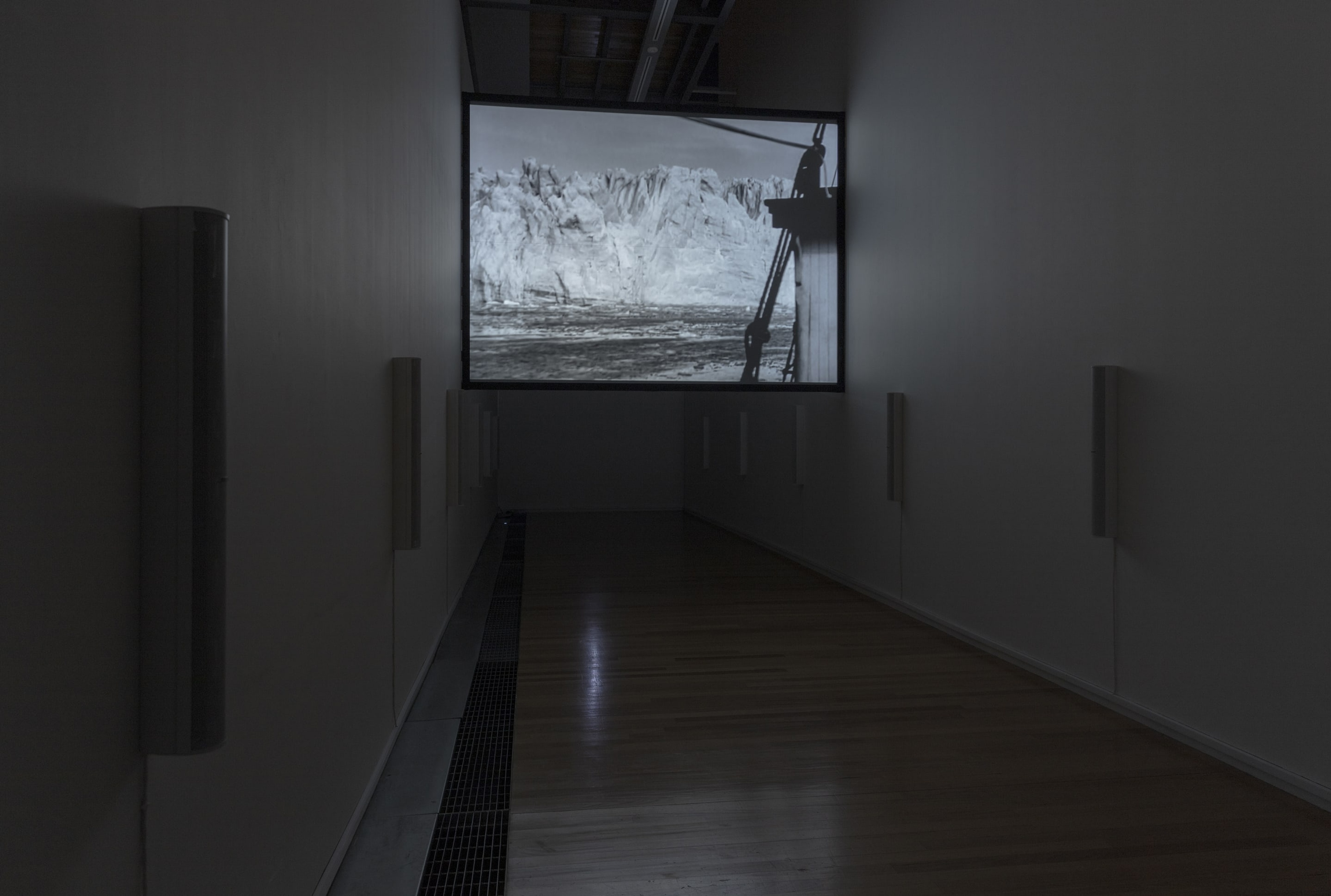 Susan Philipsz, White Flood, 2019, 12-channel sound installation and HD film, 15 minutes. Courtesy of the artist, Tanya Bonakdar Gallery, New York and Galerie Isabella Bortolozzi, Berlin. Installation view, Passages: Luke Fowler, Florian Hecker, Susan Philipsz, curated by Stephen Cleland, Adam Art Gallery Te Pātaka Toi, Victoria University of Wellington, 2019. Photo: Shaun Waugh.