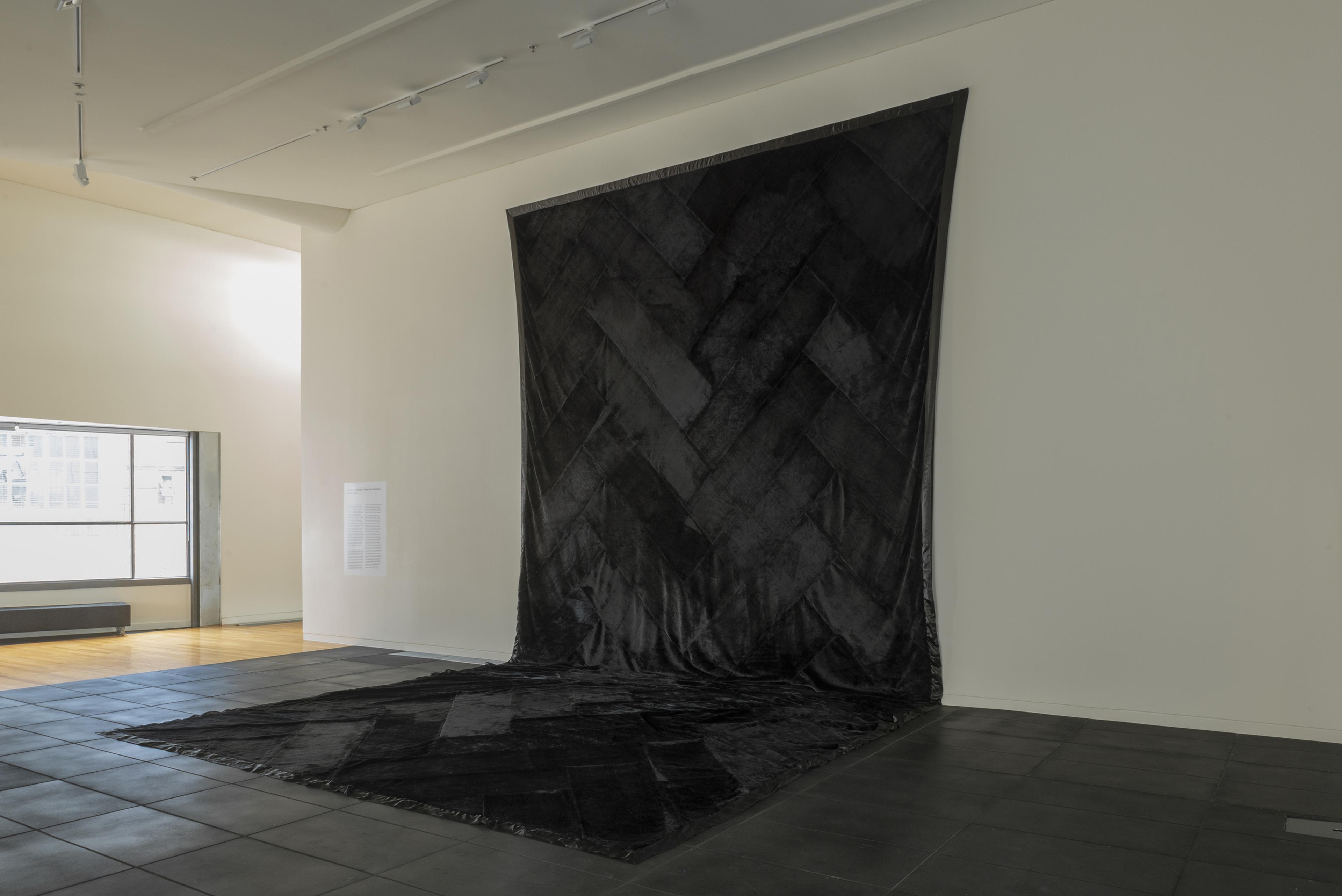 Mata Aho Collective, Te Whare Pora, 2012, woven faux mink blanket, 10m x 5m, Victoria University of Wellington Art Collection, purchased 2019. Installation view, Te whai a te whenua: Mata Aho Collective’s Te Whare Pora, Adam Art Gallery Te Pātaka Toi, Victoria University of Wellington, 6 November 2019 – 22 March 2020. Photo: Shaun Matthews