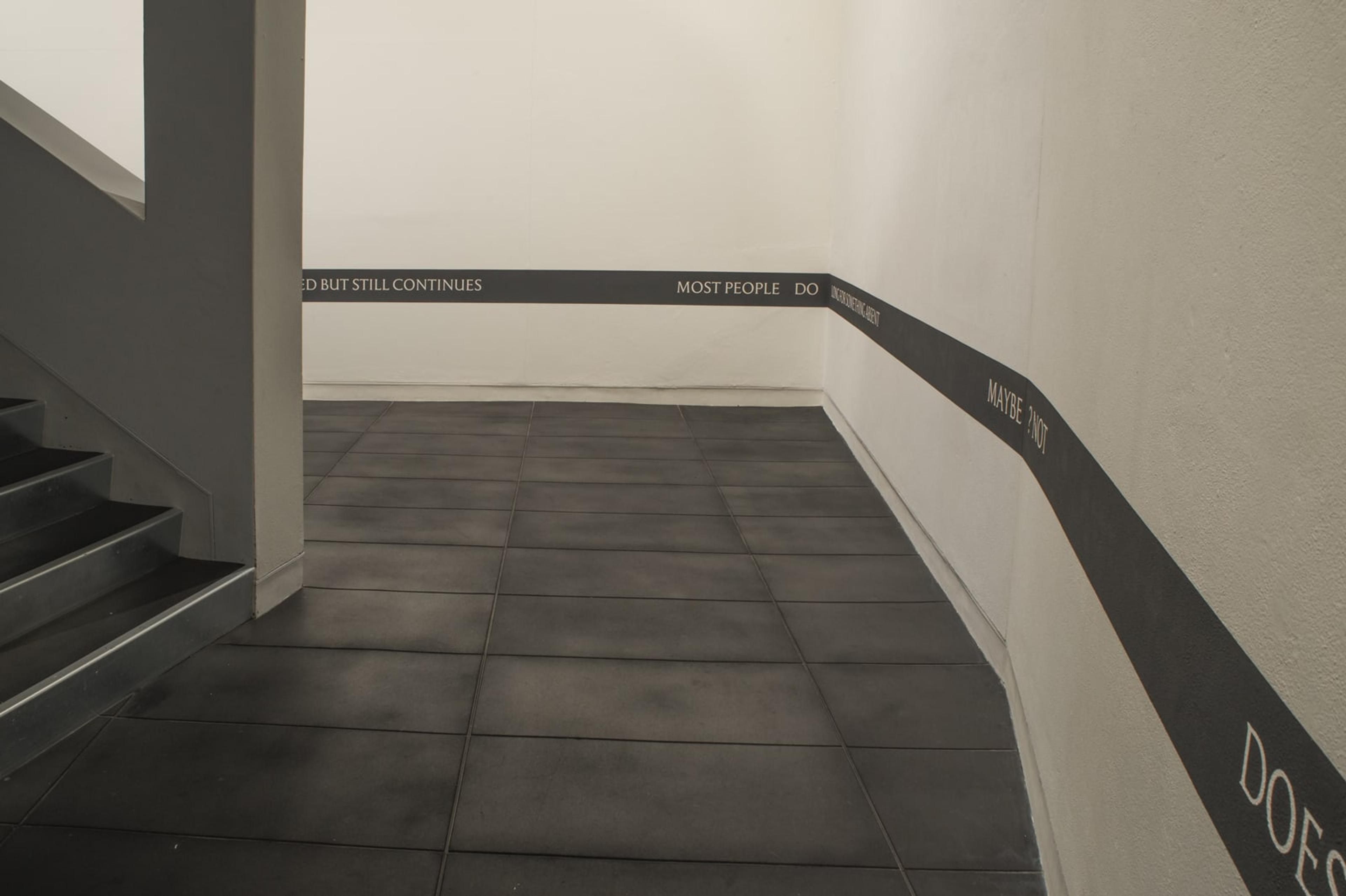 Ana Iti, Does the brick recall Pukeahu?, 2017, text, acrylic, dimensions variable, courtesy of the artist. Installation view, The earth looks upon us / Ko Papatūānuku te matua o te tangata, curated by Christina Barton, Adam Art Gallery Te Pātaka Toi, Victoria University of Wellington