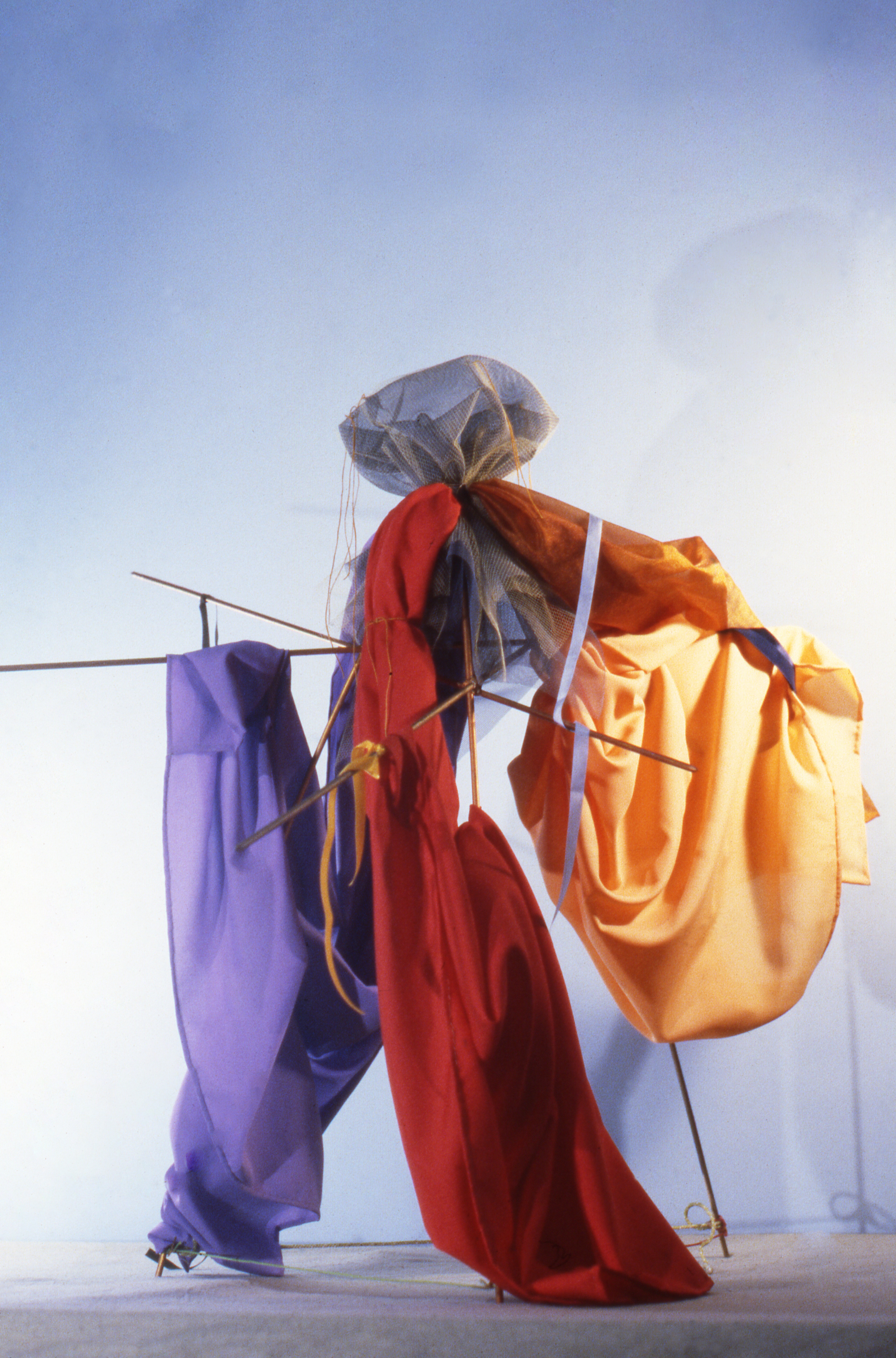 Colour photograph of a fabric sculpture back lit
