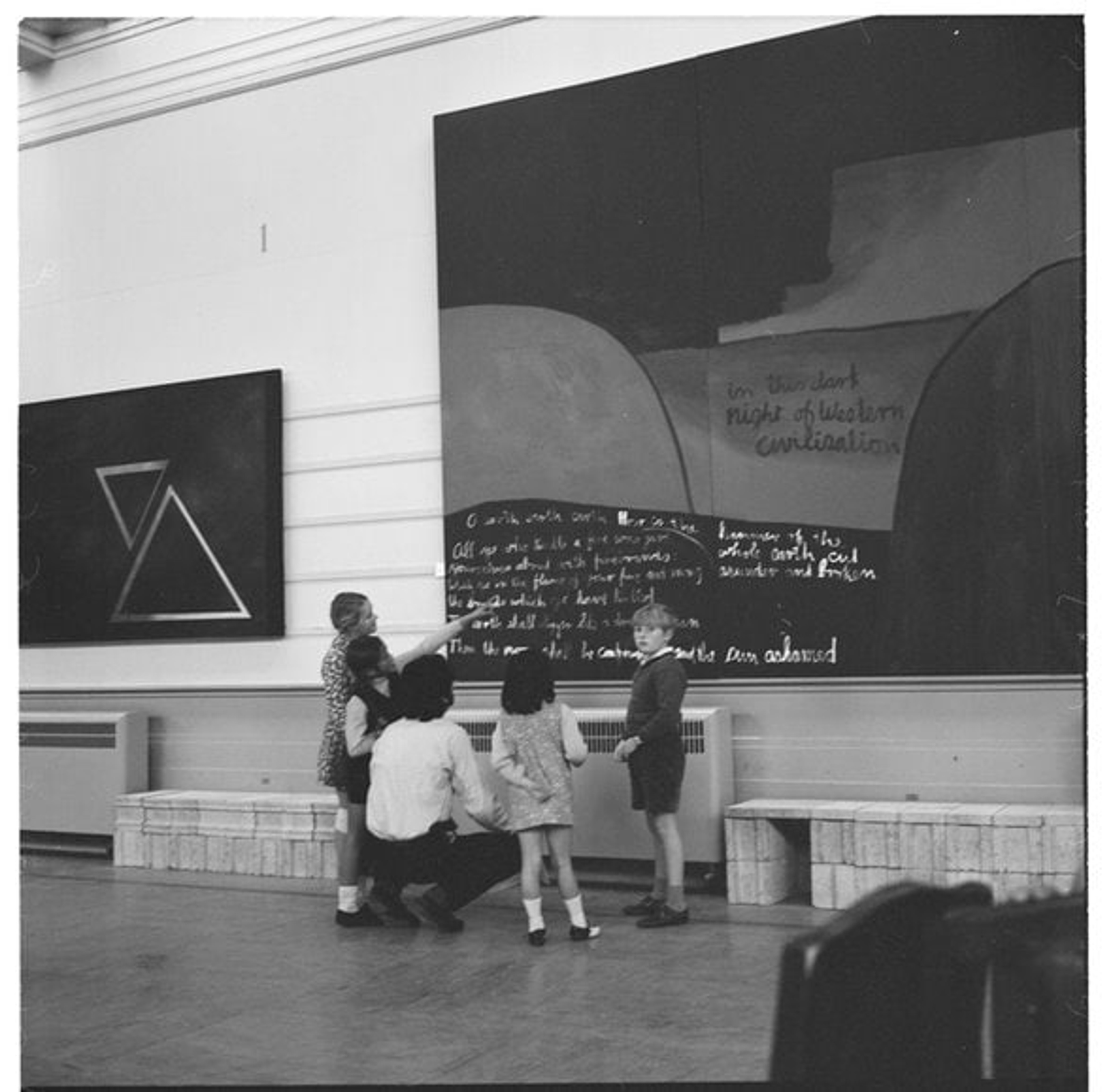 Ans Westra children looking at Colin McCahon's Gate III 1970s