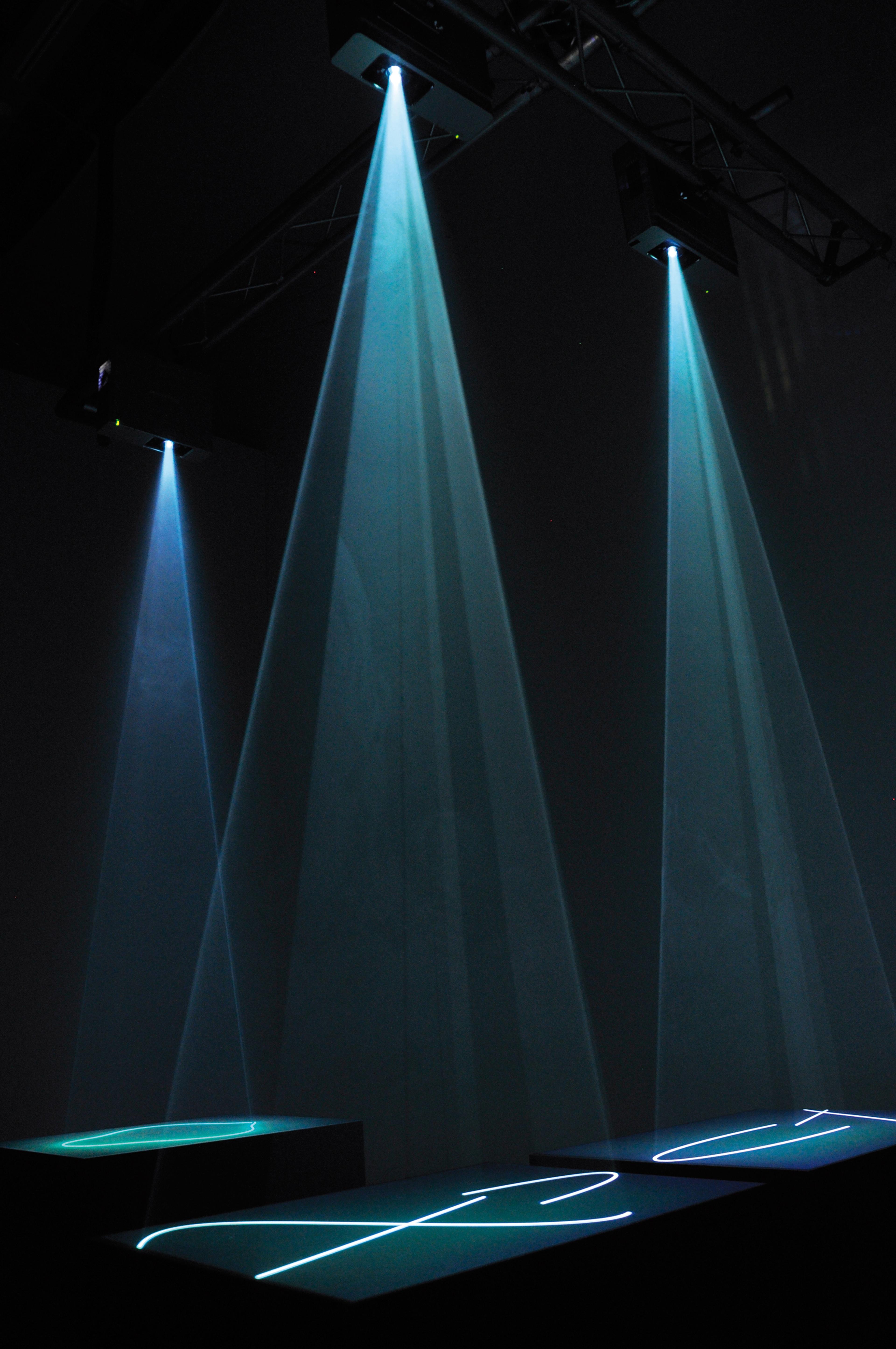 Installation view of Anthony McCall: Drawing With Light, Te Pātaka Toi Adam Art Gallery, Te Herenga Waka–Victoria University Wellington, 2010