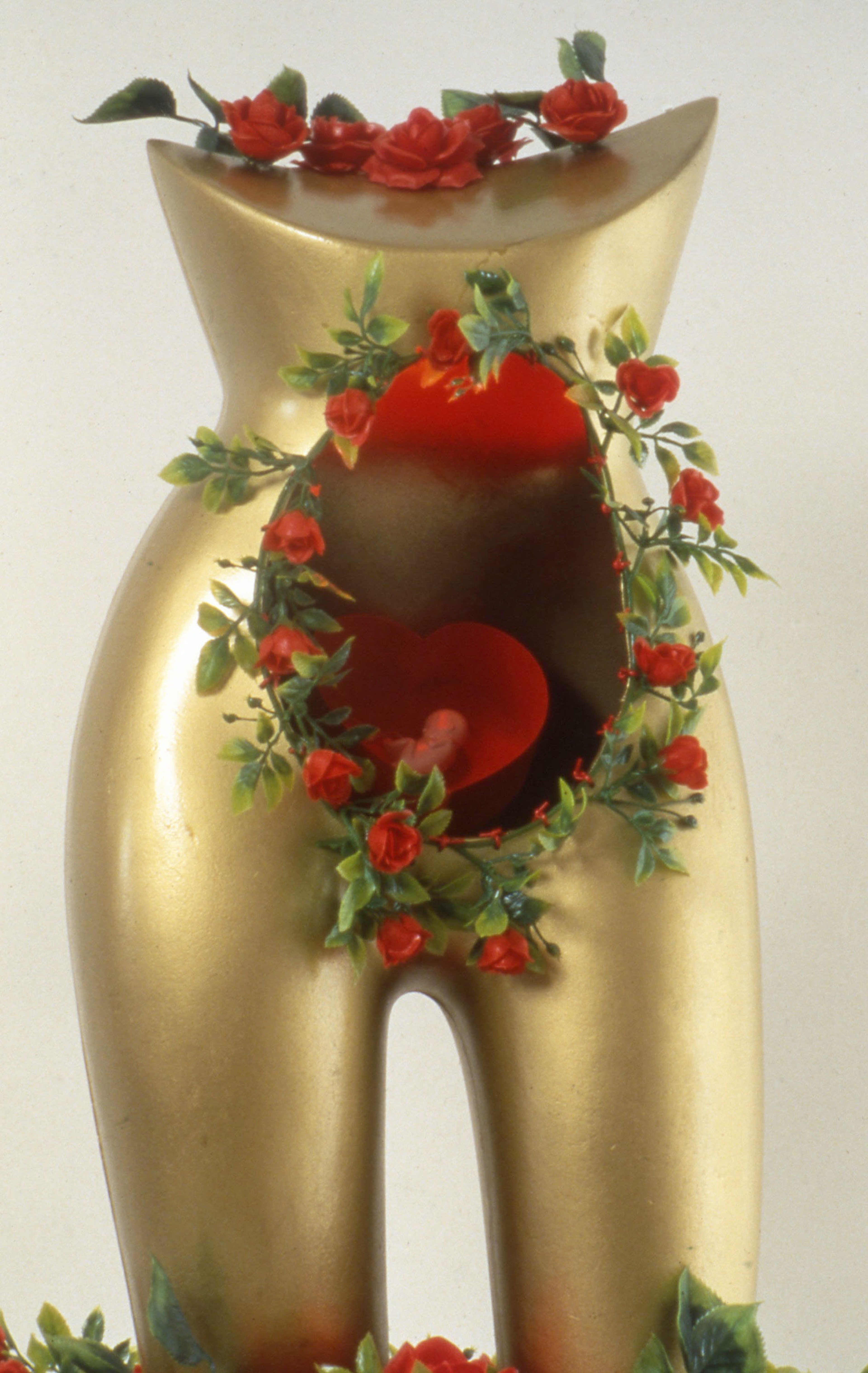 Judy Darragh, Visible Woman, 1987, plastic flowers, torso, light. Installation view, Alive! Still Life into Twenty First Century, Adam Art Gallery Te Pātaka Toi, Victoria University of Wellington, 2001