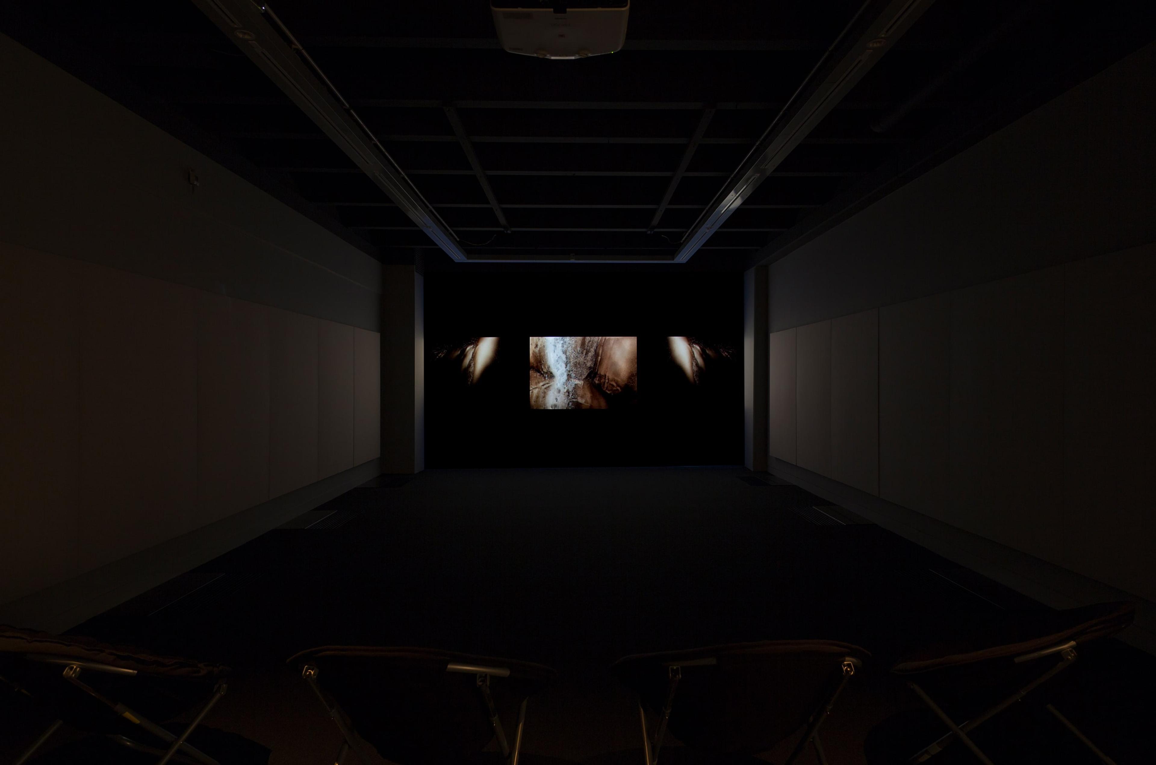 Phil Solomon, installation view of American Falls, 2000-12. Digital video, altered archival footage, colour, 5.1 and stereo sound, 55mins. Commissioned by the Corcoran Gallery of Art, Washington, D.C. Courtesy of the artist. Photo: Shaun Waugh.