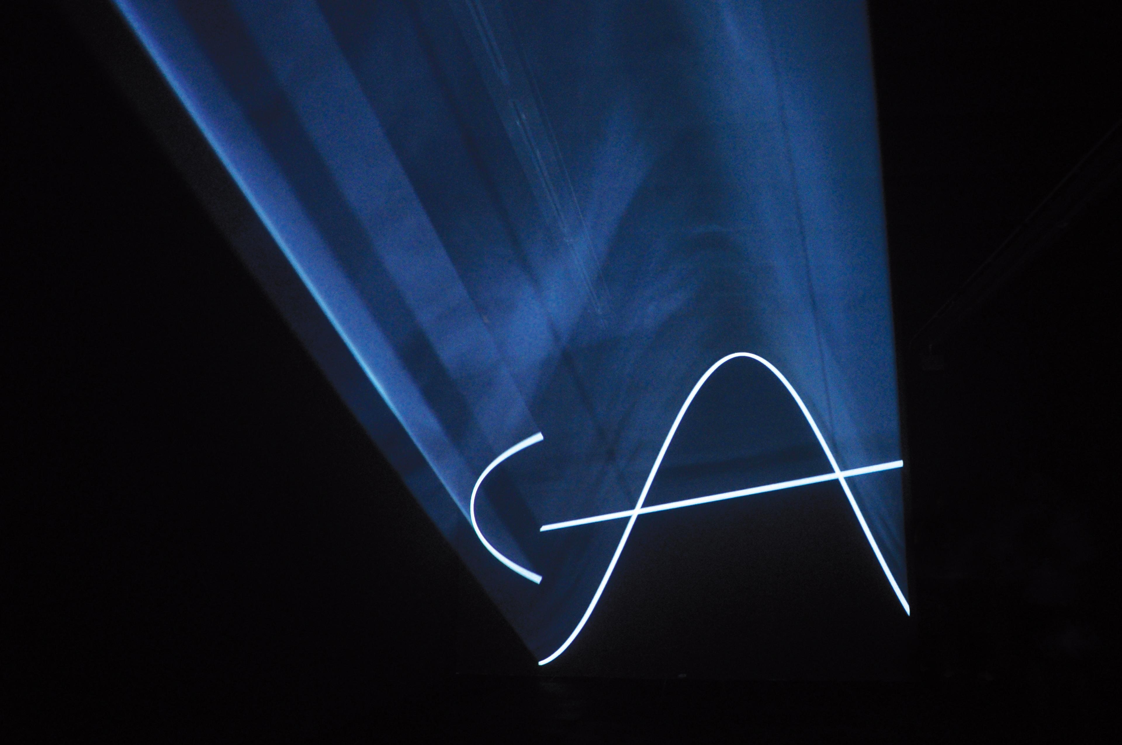 Installation view of Anthony McCall: Drawing With Light, Te Pātaka Toi Adam Art Gallery, Te Herenga Waka–Victoria University Wellington, 2010