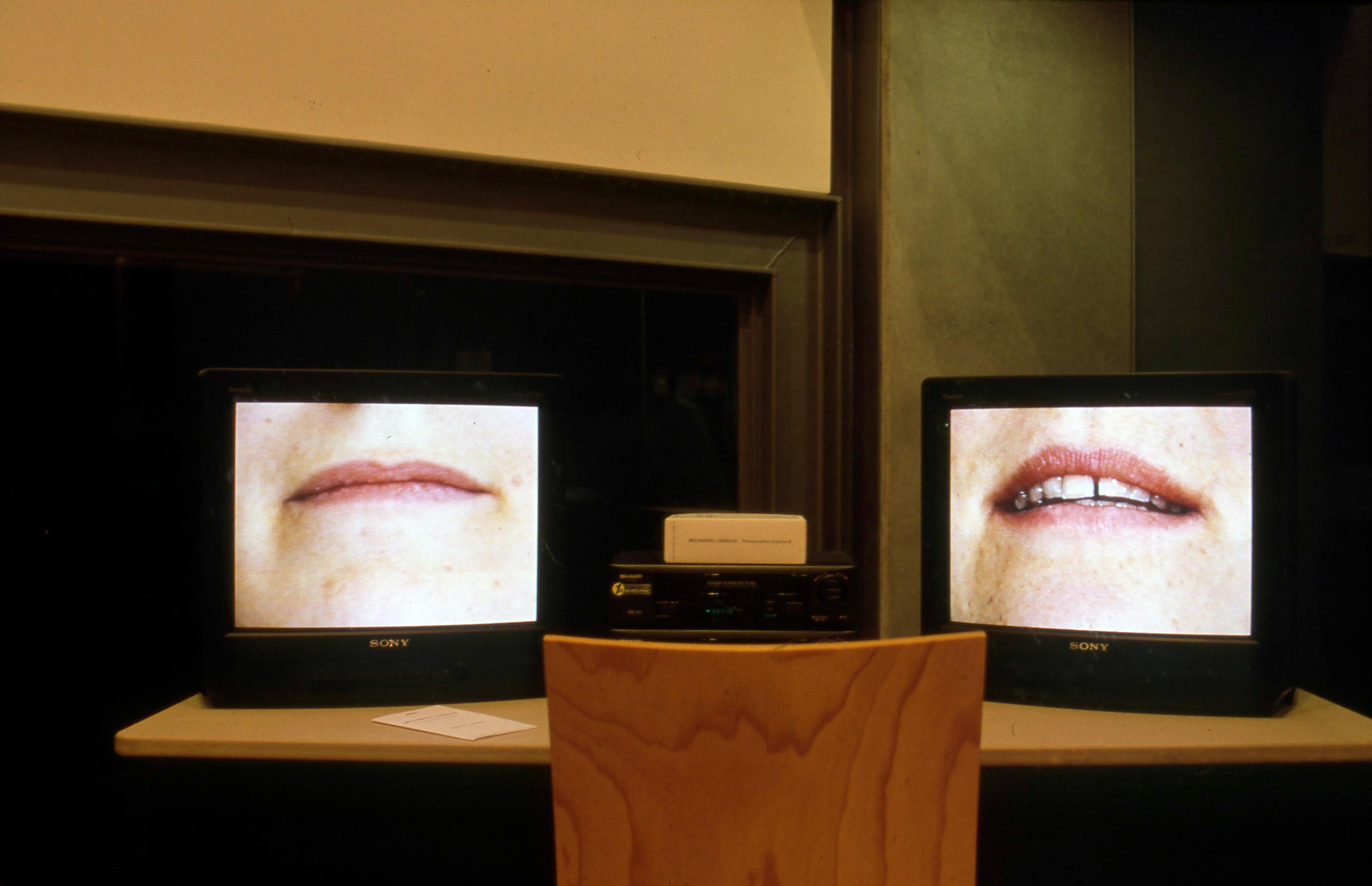 Lucy Harvey and Joanne Moar, Becoming German, Pronunciation Exercise II, 1998, video installation. Installation view, Language Matters, Adam Art Gallery Te Pātaka Toi, Victoria University of Wellington, 2000