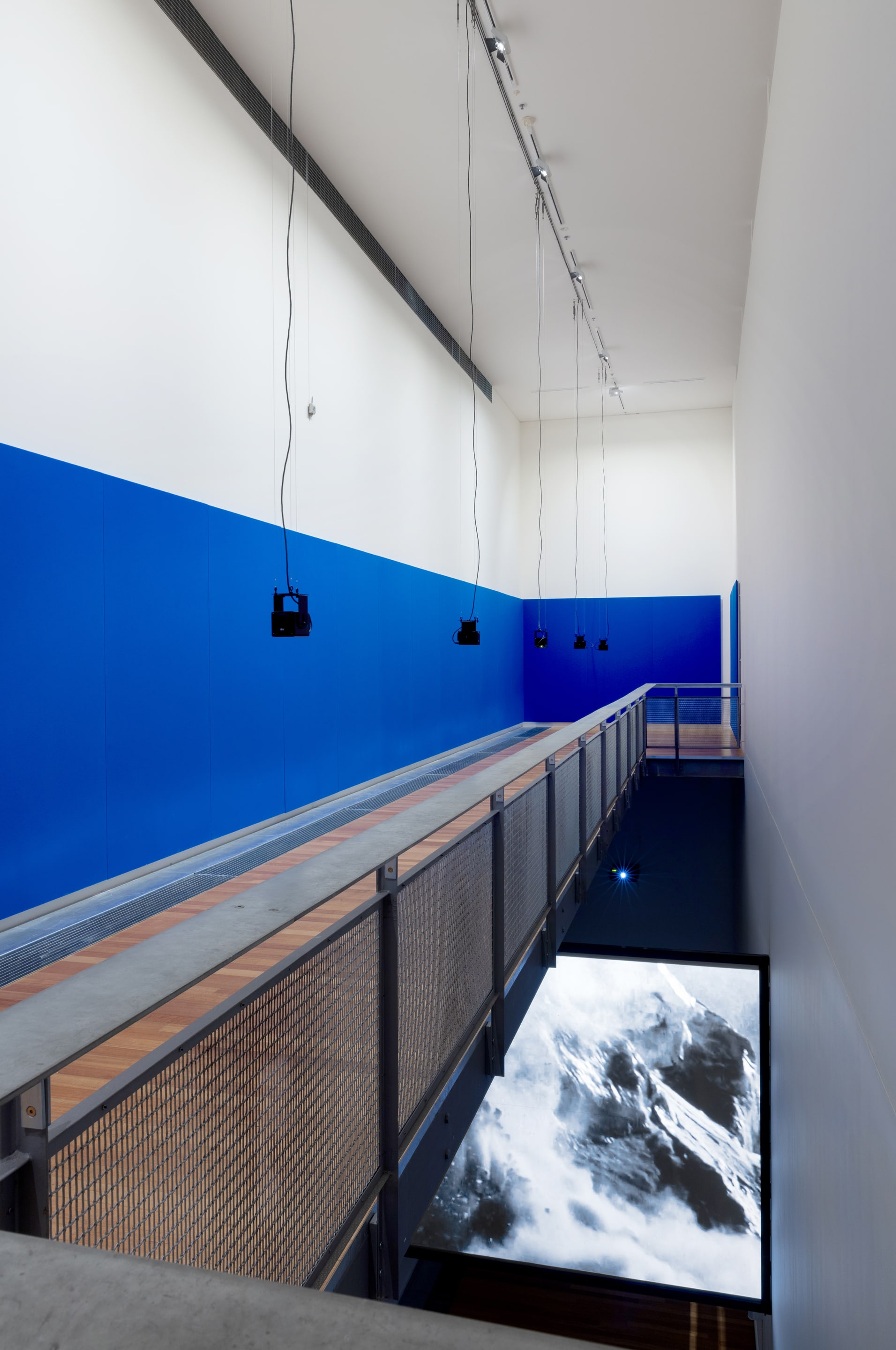 Top: Florian Hecker, Formulation DBM Self, 2015–2017, 24:07 minutes; and Formulation as Texture [hcross], 2017, 24:20 minutes, pluriphonic computer-generated sound, loudspeaker system, acoustic panel system. Courtesy of the artist, Sadie Coles HQ and Galerie Neu. Bottom: Susan Philipsz, White Flood, 2019, 12-channel sound installation and HD film, 15 minutes. Courtesy of the artist, Tanya Bonakdar Gallery and Galerie Isabella Bortolozzi. Installation view of Passages: Luke Fowler, Florian Hecker, Susan Philipsz, curated by Stephen Cleland, Adam Art Gallery Te Pātaka Toi, Victoria University of Wellington, 2019. Photo: Shaun Waugh.