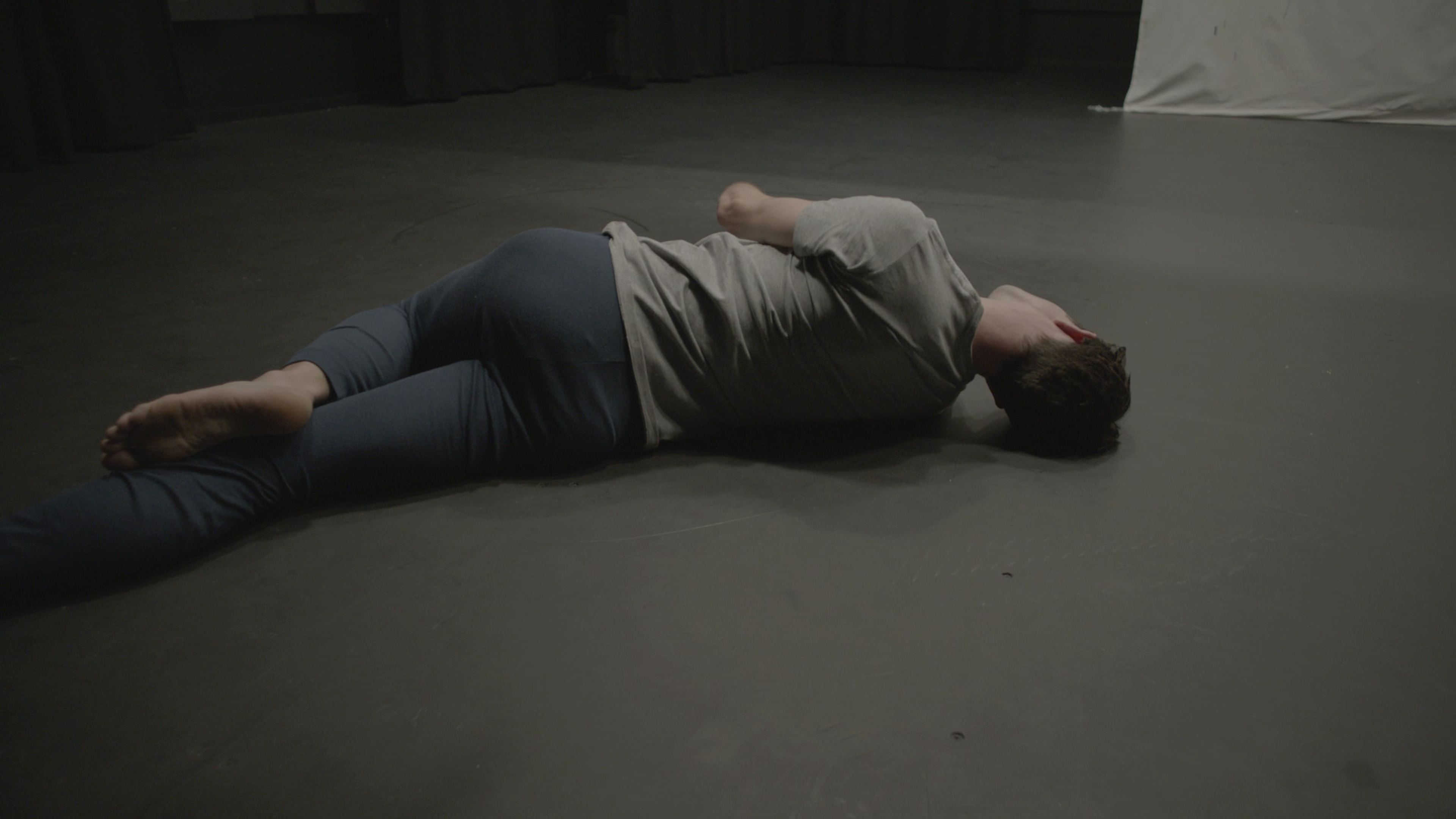 Video still, Sriwhana Spong, The Fourth Notebook, 2015, HD video, 8 mins, 36 secs. Courtesy of Michael Lett, Auckland. Dancer: Benjamin Ord. Commissioned by Carriageworks, Sydney. In the exhibition Inhabiting Space at the Adam Art Gallery Te Pātaka Toi, Victoria University of Wellington