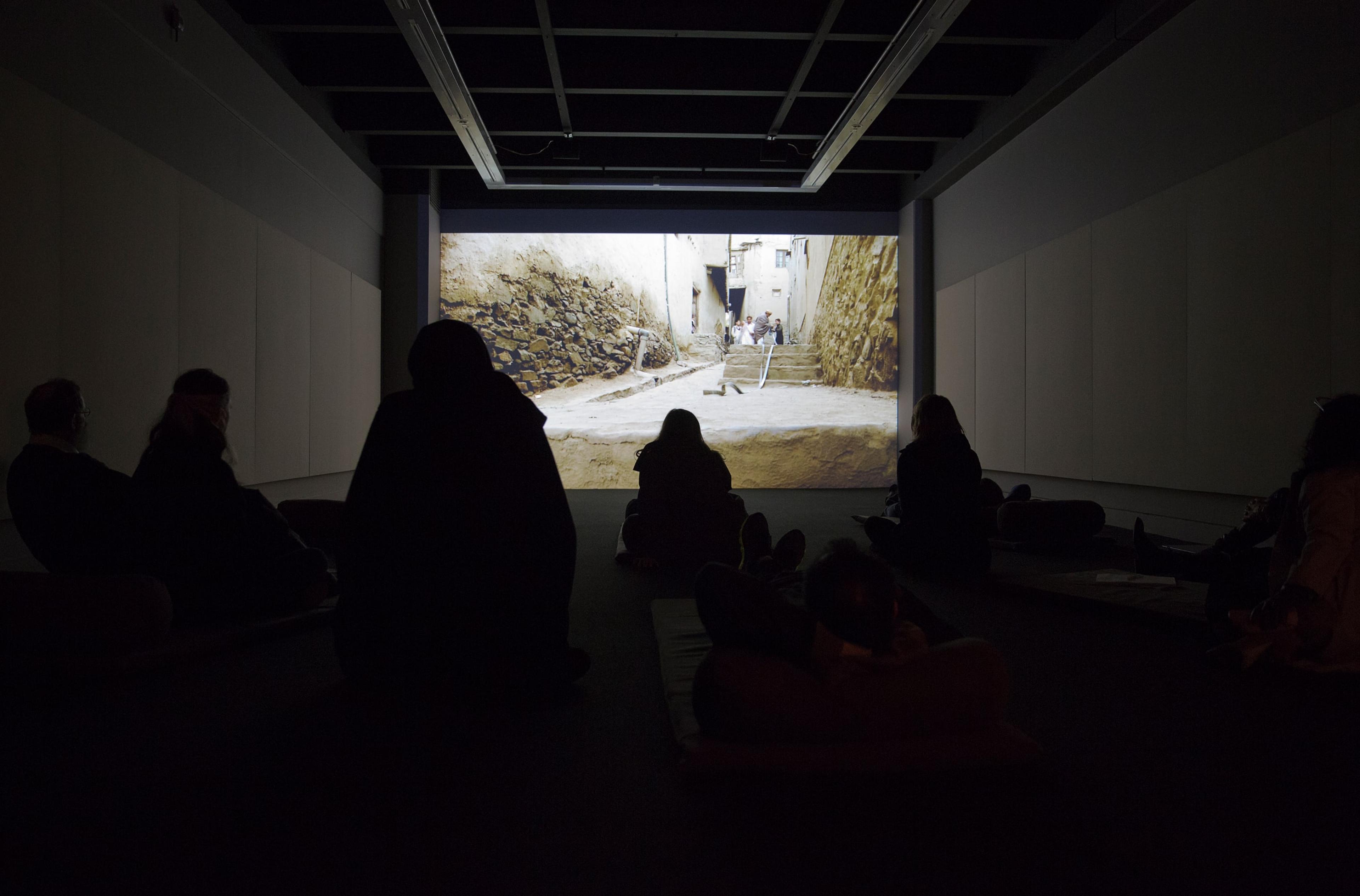 Installation view of Francis Alÿs (in collaboration with Julien Devaux and Ajmal Maiwandi), Reel-Unreel (2011) at the Adam Art Gallery. Single channel video projection, 19:28min, color, sound. Photo: Shaun Waugh.
