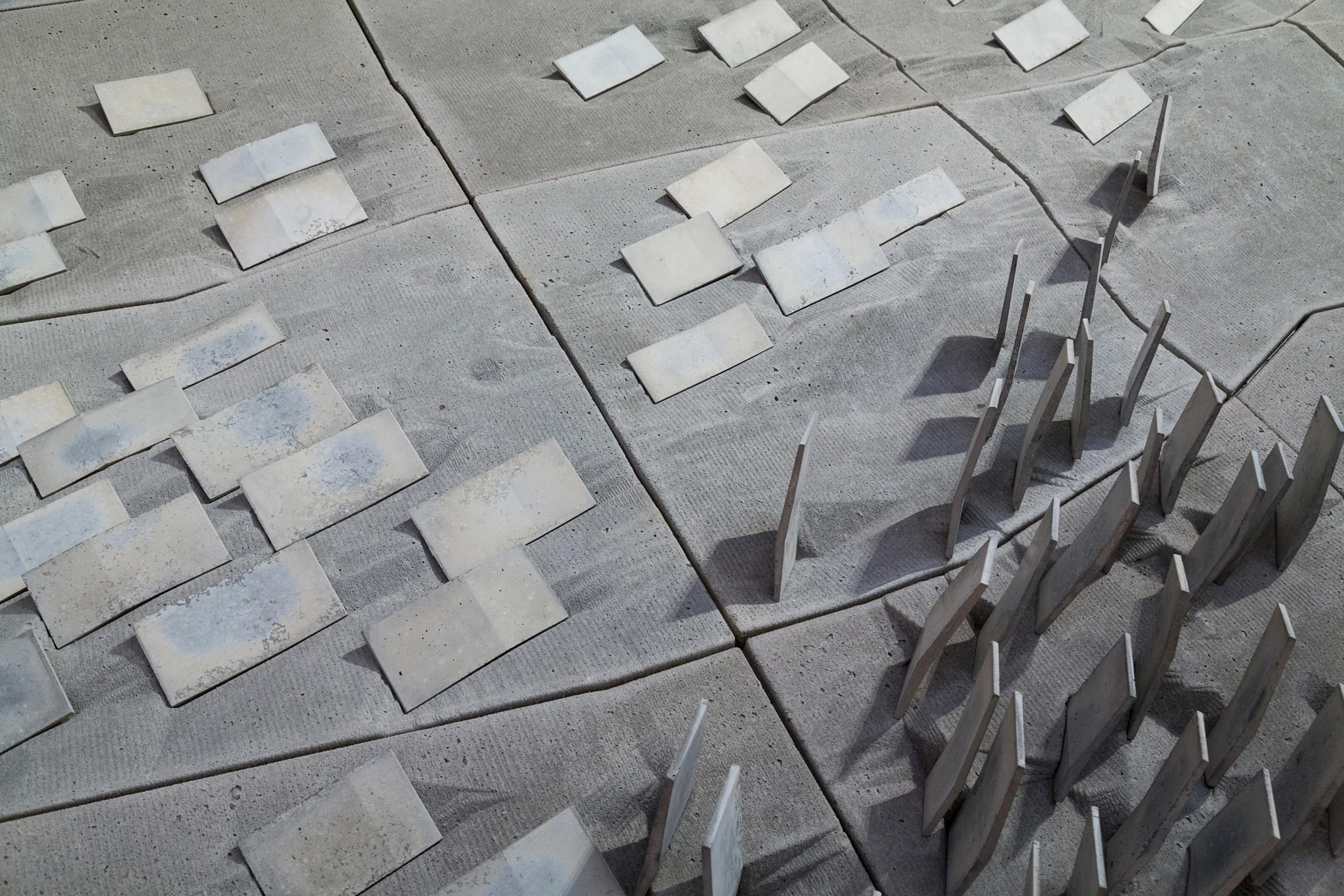 Simon Twose, detail view of Concrete Drawing, 2014-5, concrete, polystyrene, wax, photographs and graphite, in the exhibition Drawing Is/Not Building at the Adam Art Gallery Te Pātaka Toi, Victoria University of Wellington (photo: Shaun Waugh)