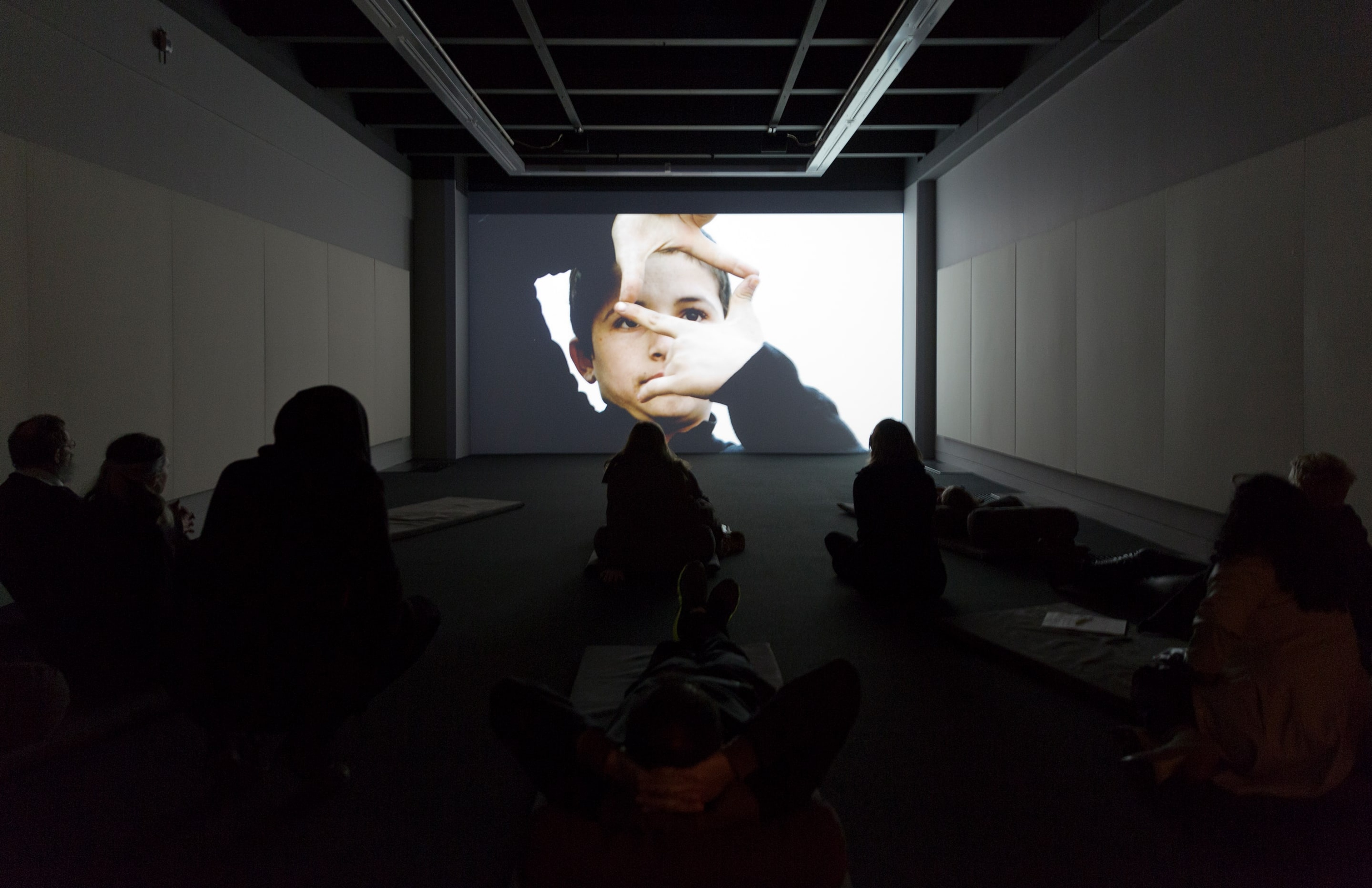 Installation view of Francis Alÿs (in collaboration with Julien Devaux and Ajmal Maiwandi), Reel-Unreel (2011) at the Adam Art Gallery. Single channel video projection, 19:28min, color, sound. Photo: Shaun Waugh.
