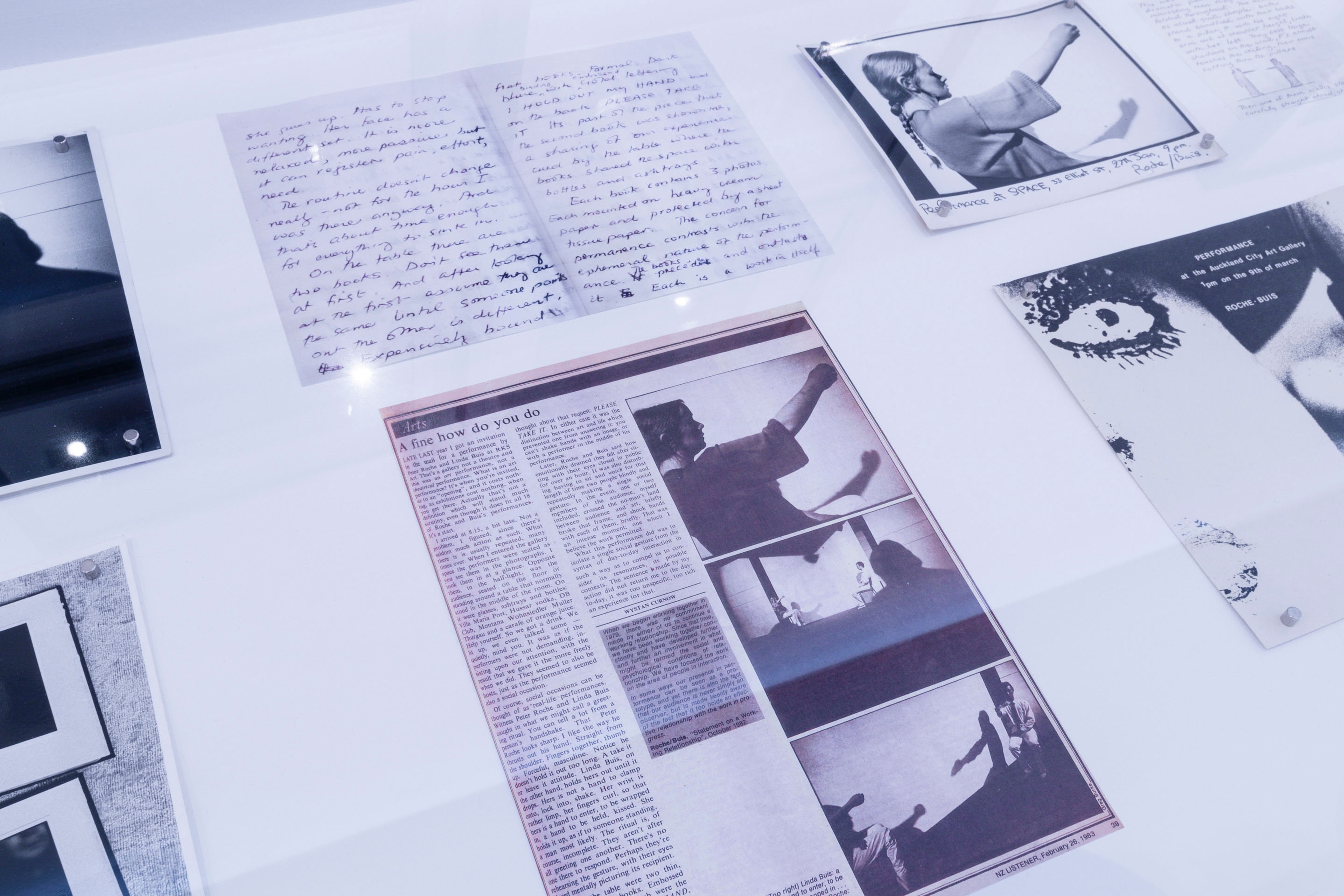 Three black and white photographic prints installed at the Adam Art Gallery