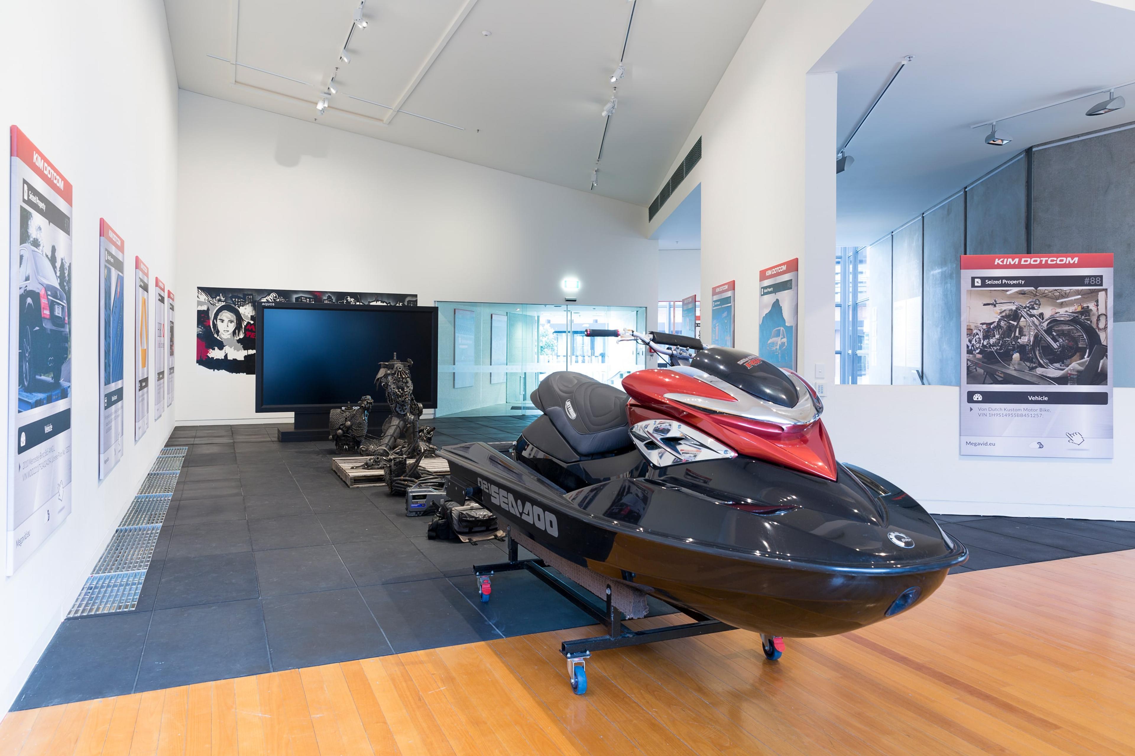 Simon Denny, The Personal Effects of Kim Dotcom 2014, installation view at the Adam Art Gallery, Victoria University of Wellington ©Simon Denny (photo: Shaun Waugh).