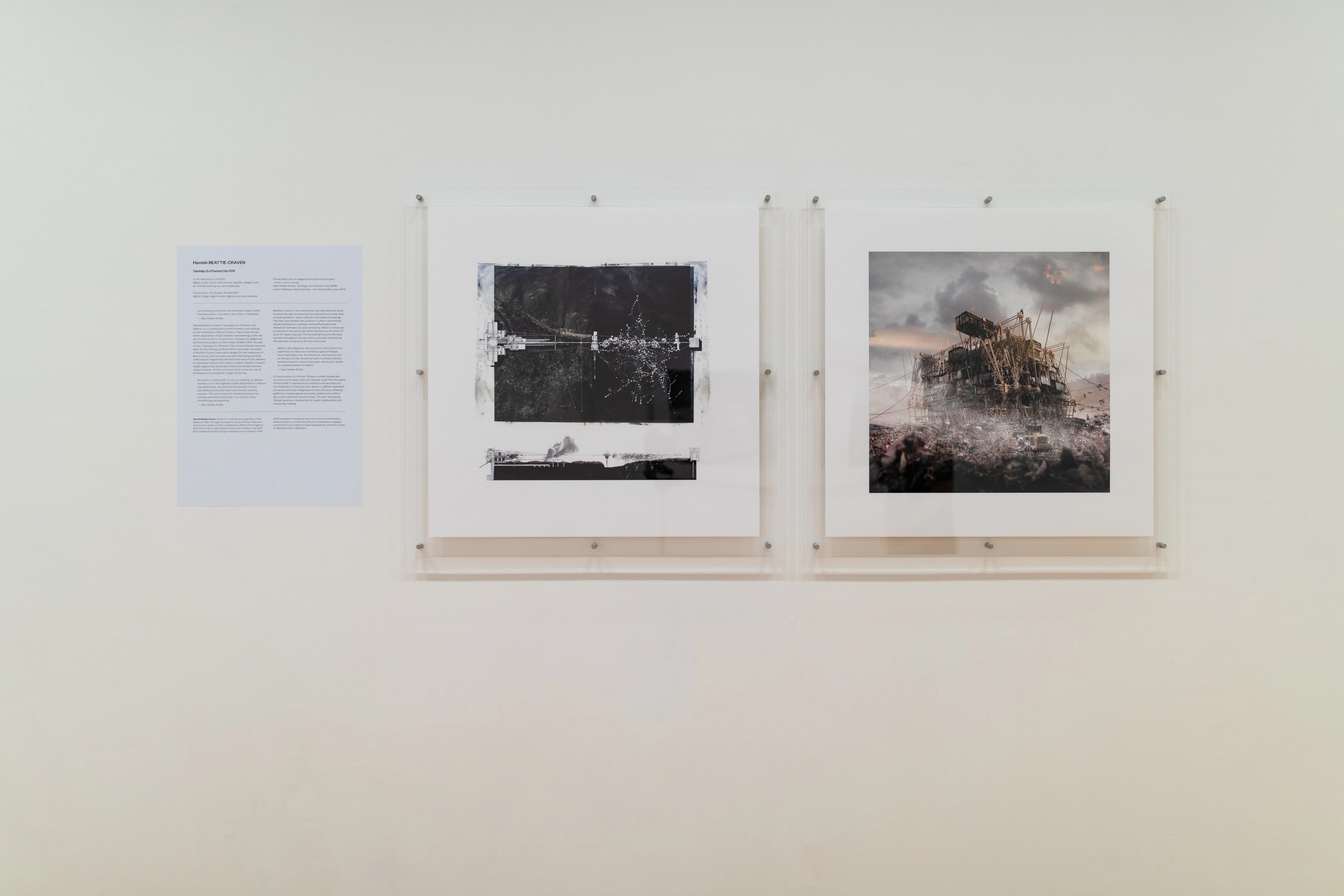 Straight on view of a gallery wall with text and square architectural images in perspex mounts. Daniel K. Brown 