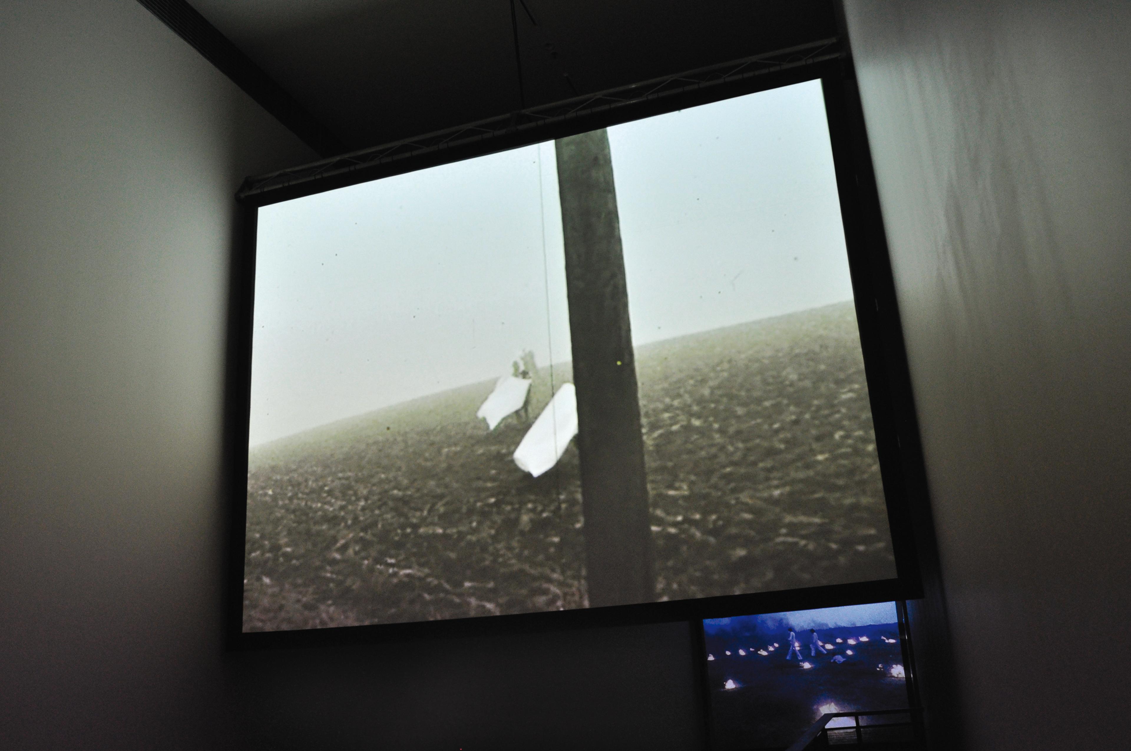 Installation view of Anthony McCall: Drawing With Light, Te Pātaka Toi Adam Art Gallery, Te Herenga Waka–Victoria University Wellington, 2010