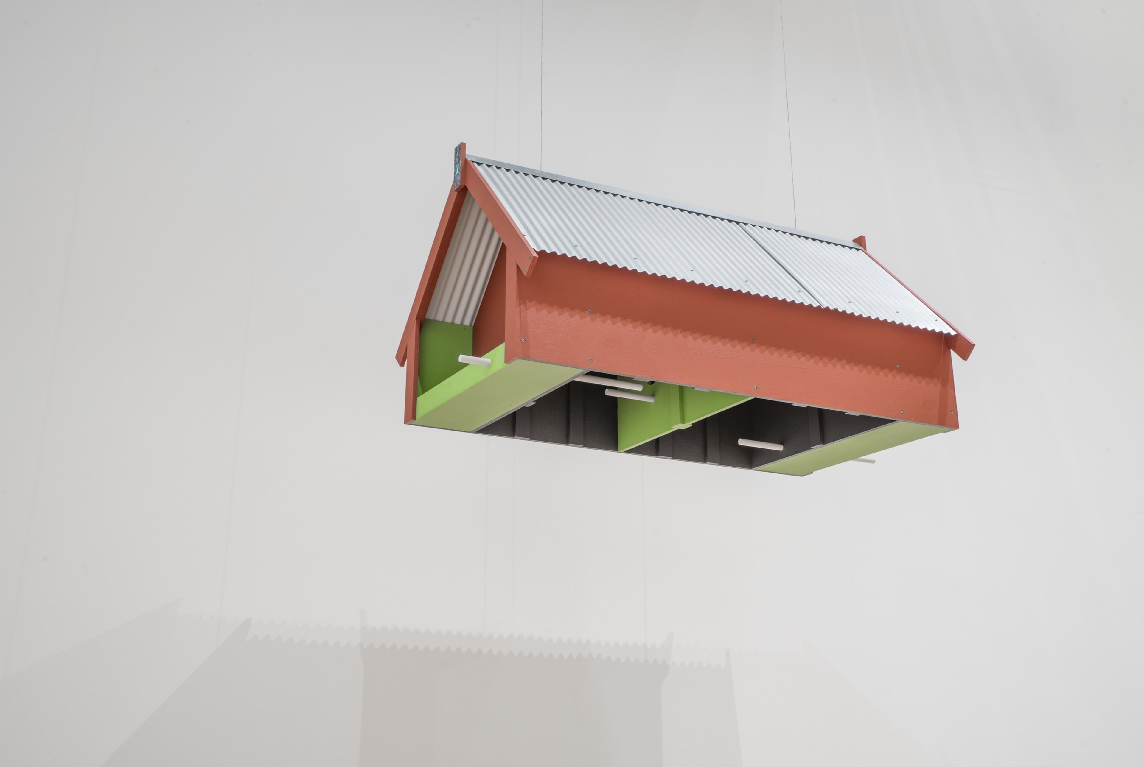 Yllwbro, Te Tohu o Kōanga, 2017, plywood, baby zincalume, steel screws, panel pin nails, pine dowel, braided wire, Le Corbusier Polychromie acrylic, paua shell laminate; Courtesy of the artists and Mokopōpaki, Auckland. On view in the exhibition The Tomorrow People, Adam Art Gallery Te Pātaka Toi, 22 July – 1 October 2017, photo: Shaun Matthews