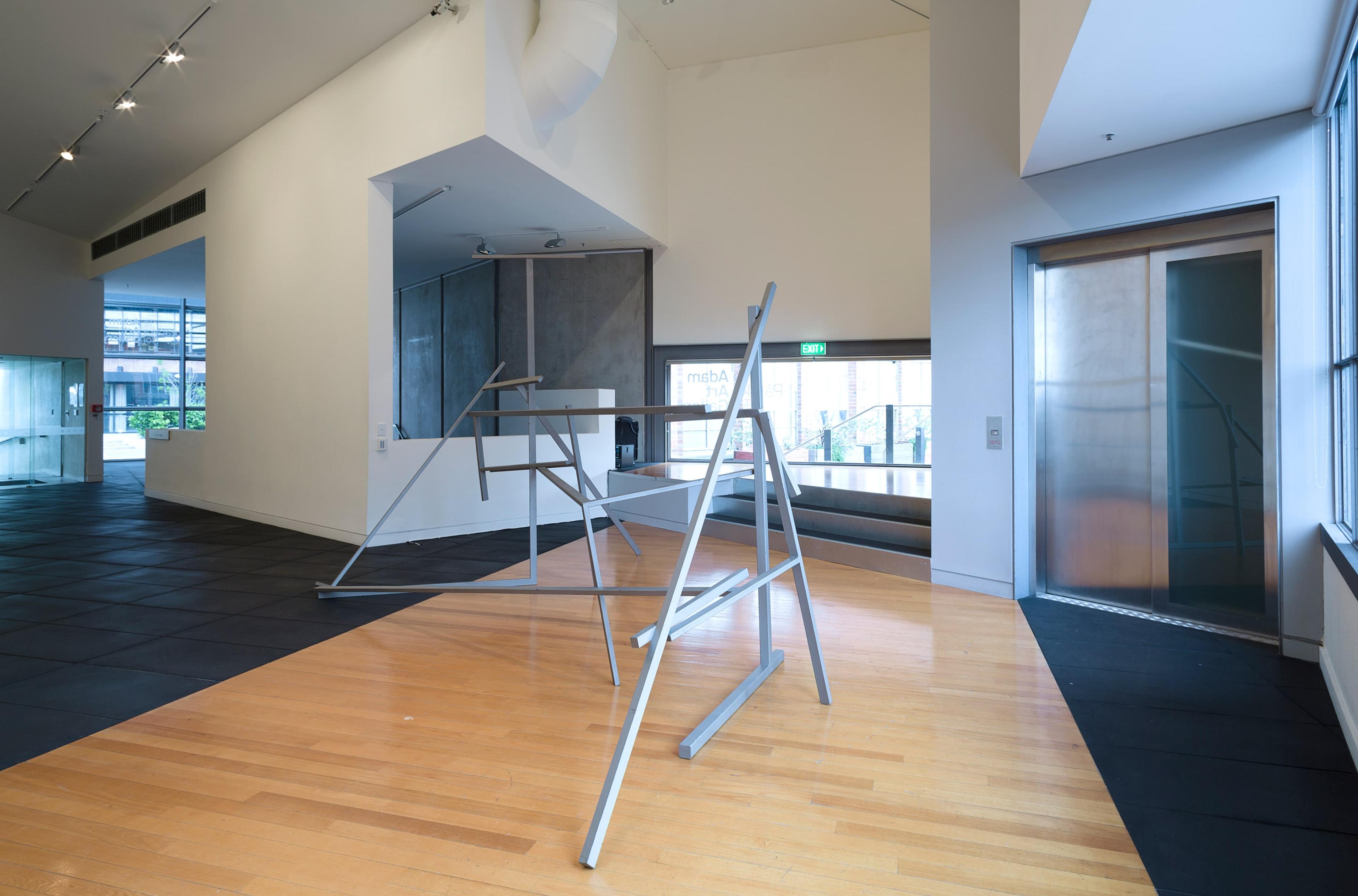 Installation view of John Panting: Spatial Constructions at the Adam Art Gallery, showing 5.07 (Untitled III), 1972–73, steel, 290 x 455 x 244cm. Collection of Auckland Art Gallery Toi o Tāmaki, purchased 1976. Photo: Shaun Waugh