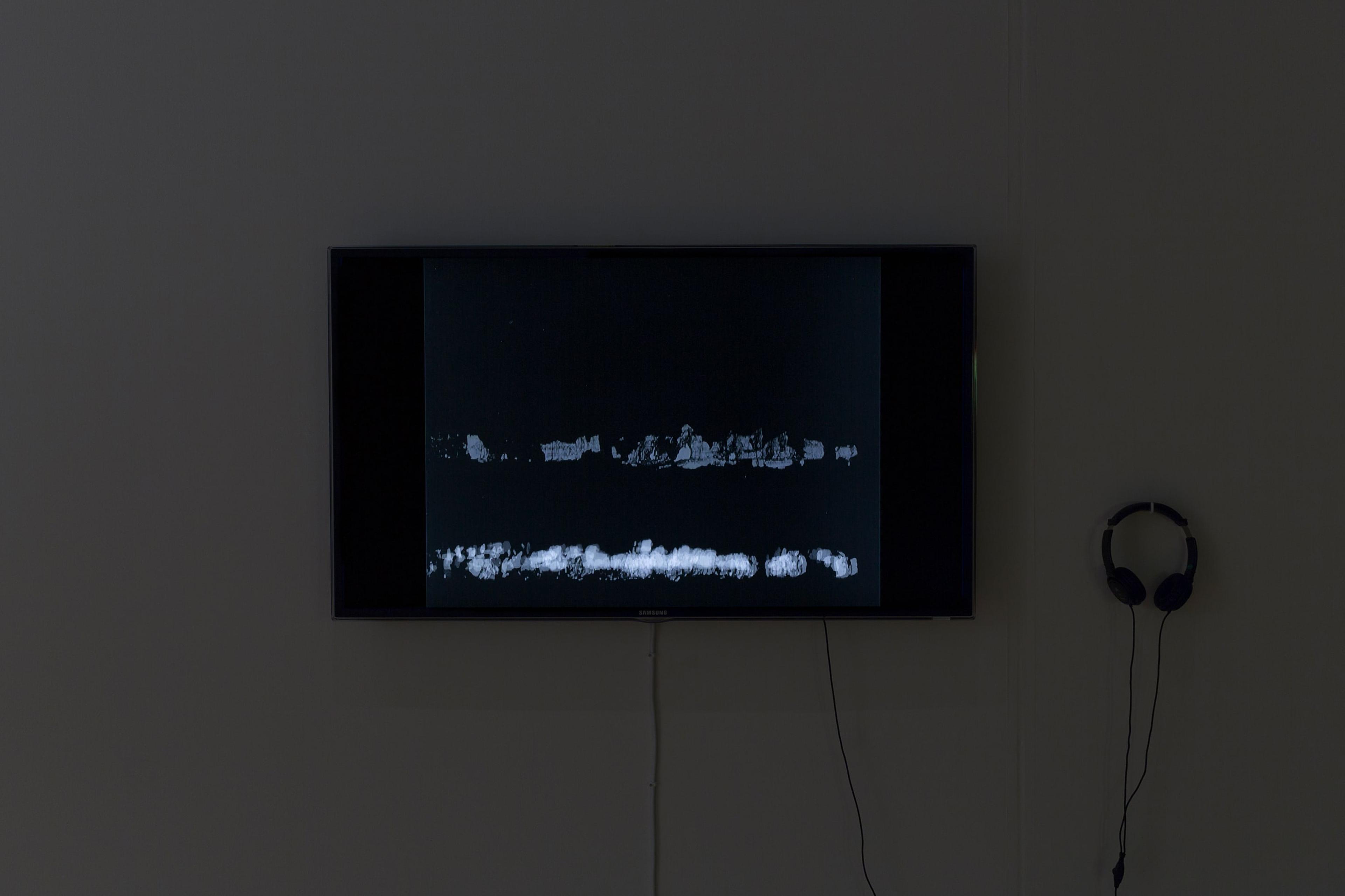 Len Lye, installation view of Particles in Space, 1957/1980. 16mm transferred to digital video, b&w, sound, 4mins. From material preserved and made available by the New Zealand Film Archive Ngā Kaitiaki O Ngā Taonga Whitiāhua. Courtesy of the Len Lye Foundation. Photo: Shaun Waugh.