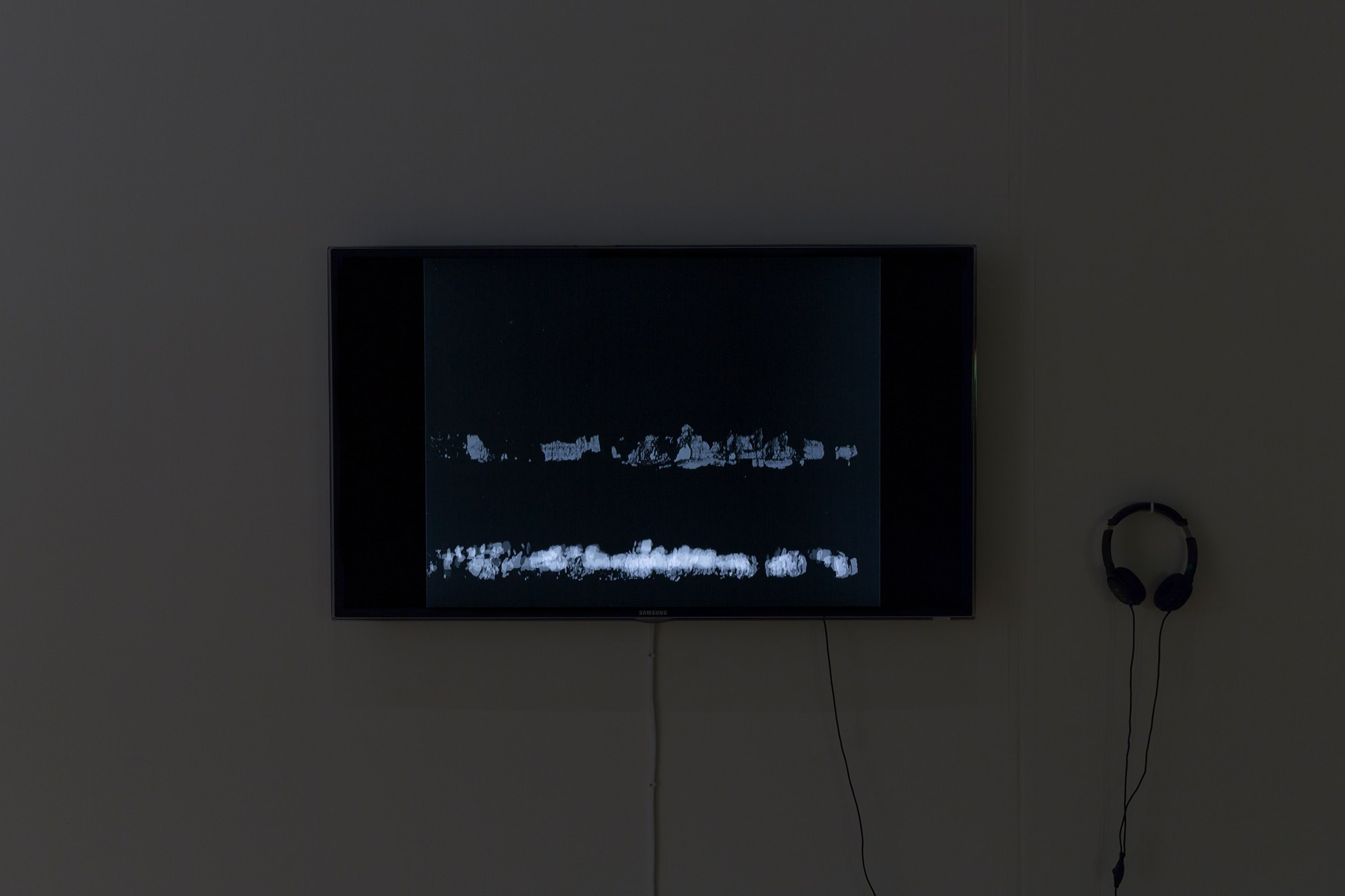 Len Lye, installation view of Particles in Space, 1957/1980. 16mm transferred to digital video, b&w, sound, 4mins. From material preserved and made available by the New Zealand Film Archive Ngā Kaitiaki O Ngā Taonga Whitiāhua. Courtesy of the Len Lye Foundation. Photo: Shaun Waugh.