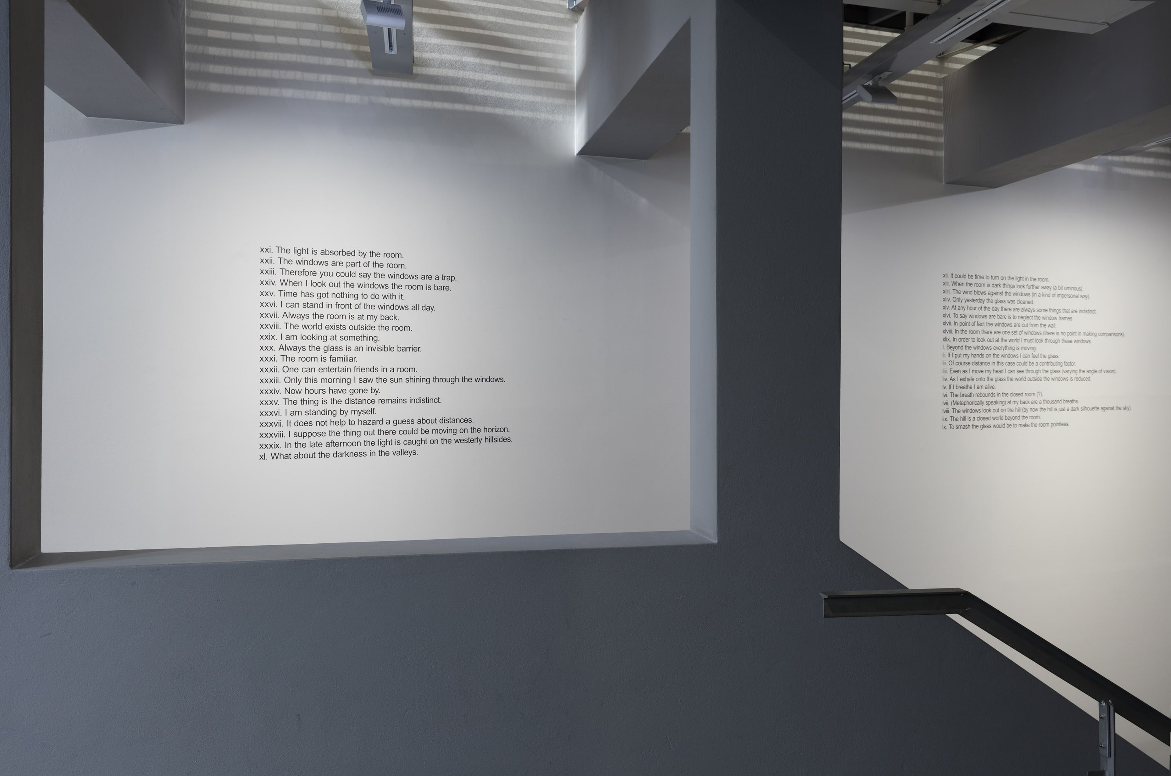 Installation view, Mike Parr, Facts about the Room, 1970/2016, vinyl lettering on wall, collection of Auckland Art Gallery Toi o Tamaki. In the exhibition Inhabiting Space at the Adam Art Gallery Te Pātaka Toi, Victoria University of Wellington (photo: Shaun Waugh)