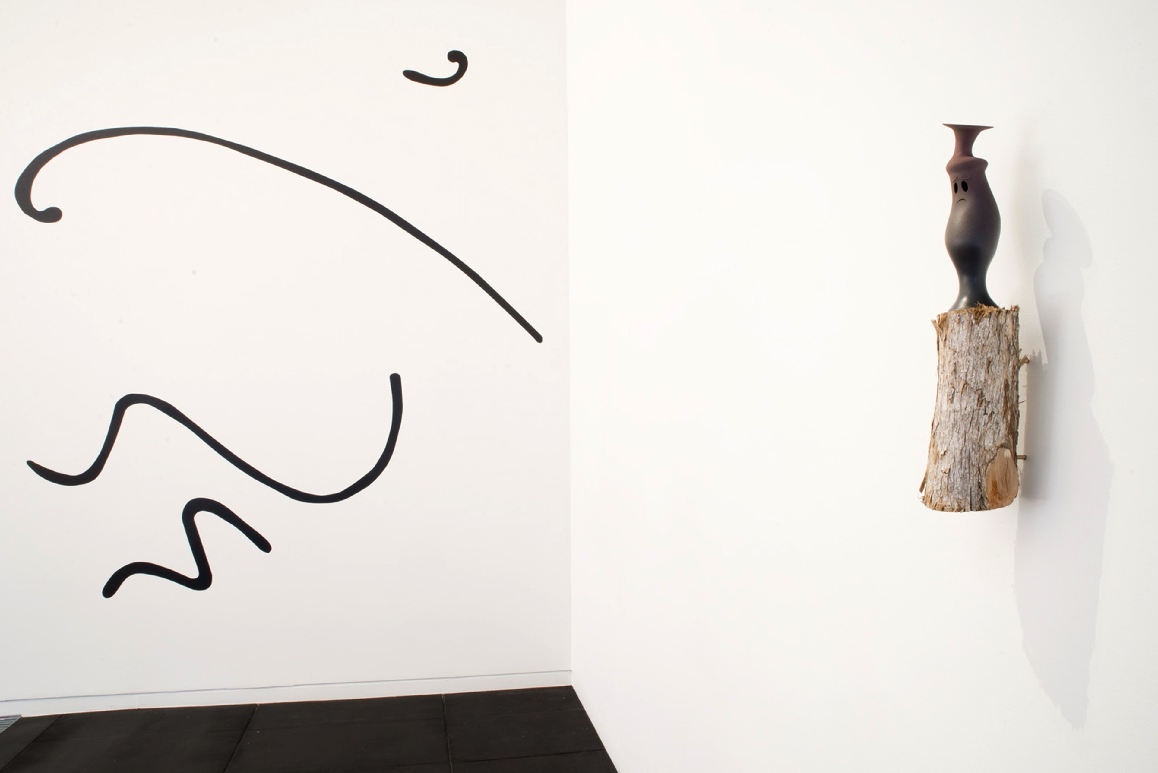 Glenn Otto, An honest means to a dishonest living, 2017, acrylic on wall; Sorawit Songsataya, Sad, 2017, 3D printed plastic, log; on view in Acting Out at Adam Art Gallery Te Pātaka Toi, photo: Shaun Matthews