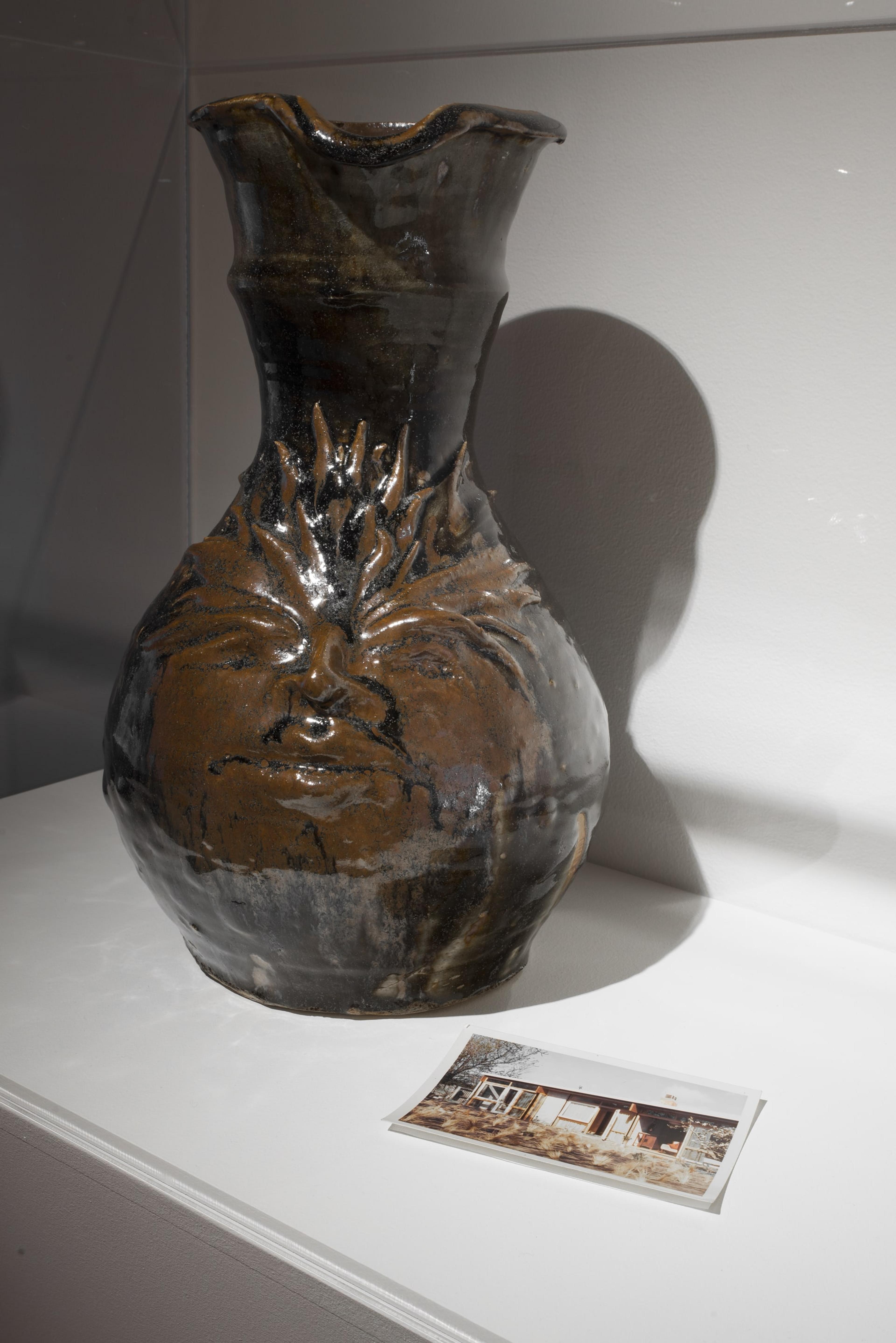 Daegan Wells, Bleached Terraces, 2017, stoneware, photograph, shelf, courtesy the artist. On view in the exhibition The Tomorrow People, Adam Art Gallery Te Pātaka Toi, 22 July – 1 October 2017, photo: Shaun Matthews