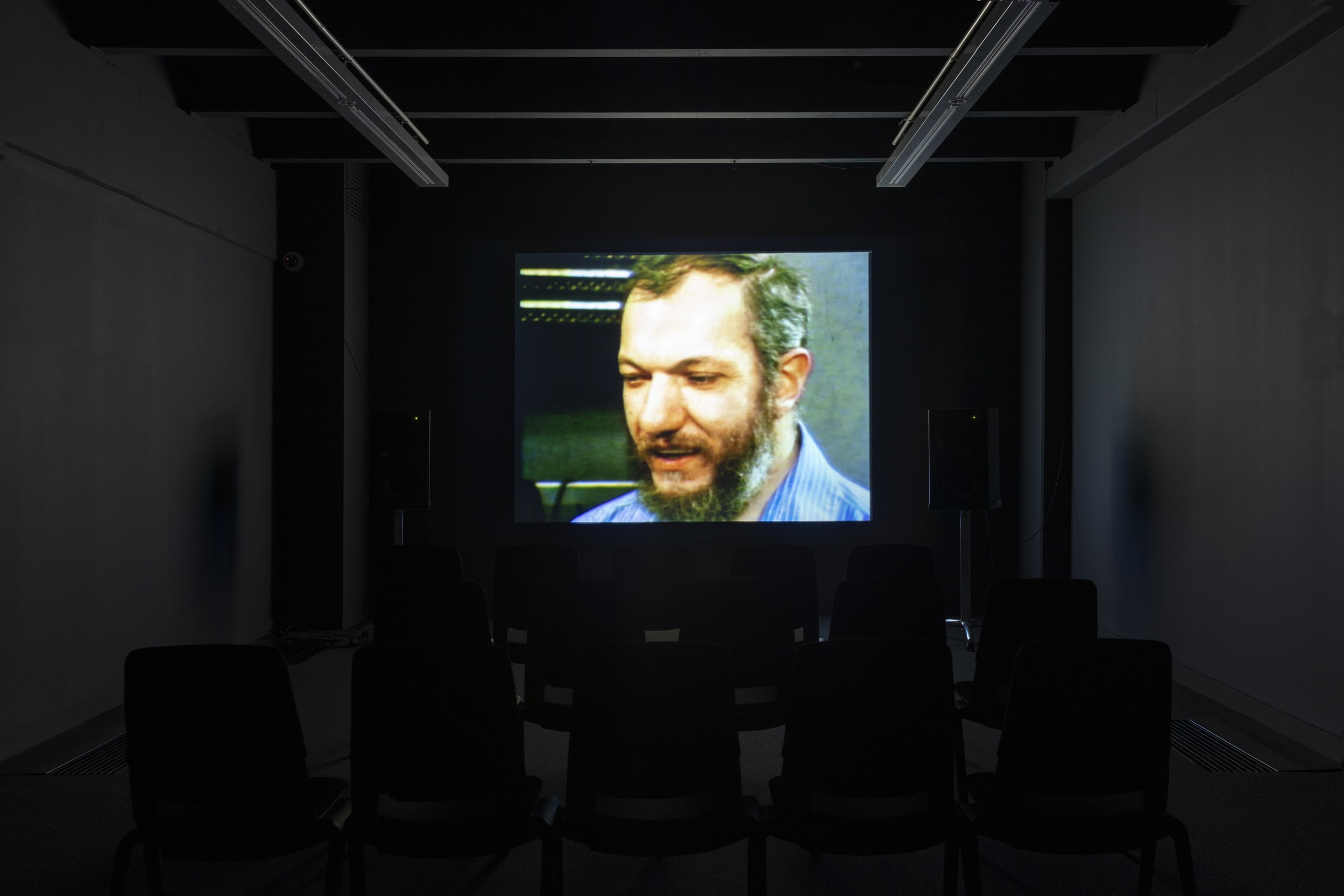 Luke Fowler, Electro-Pythagoras (A Portrait of Martin Bartlett), 2017, 16mm film transferred to HD video, 45 Minutes, colour, stereo, 4:3. Courtesy of the artist, The Modern Institute, Glasgow and Gisela Capitain Gallery, Cologne. Installation view, Passages: Luke Fowler, Florian Hecker, Susan Philipsz, curated by Stephen Cleland, Adam Art Gallery Te Pātaka Toi, Victoria University of Wellington, 2019. Photo: Shaun Waugh.