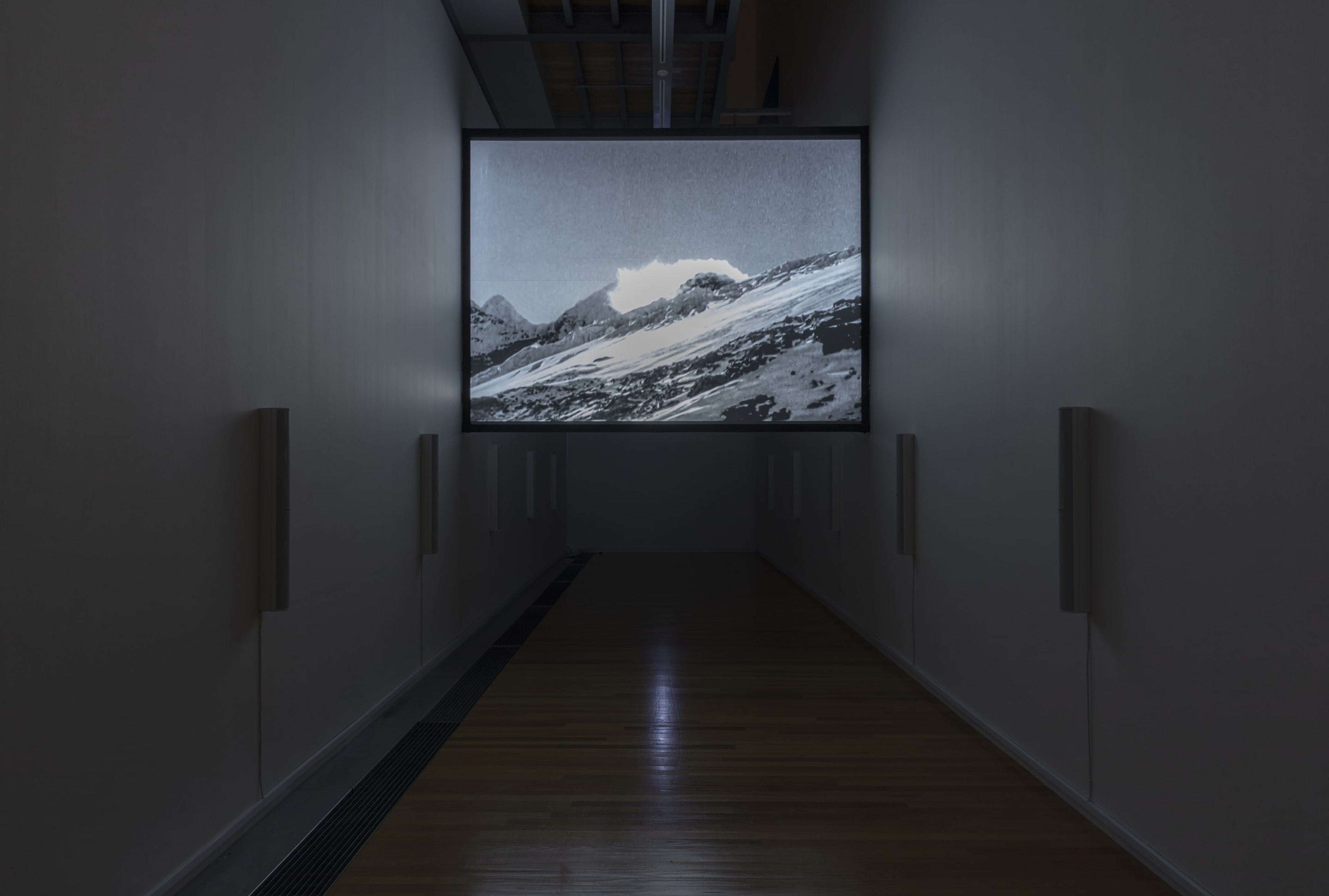 Susan Philipsz, White Flood, 2019, 12-channel sound installation and HD film, 15 minutes. Courtesy of the artist, Tanya Bonakdar Gallery, New York and Galerie Isabella Bortolozzi, Berlin. Installation view, Passages: Luke Fowler, Florian Hecker, Susan Philipsz, curated by Stephen Cleland, Adam Art Gallery Te Pātaka Toi, Victoria University of Wellington, 2019. Photo: Shaun Waugh.