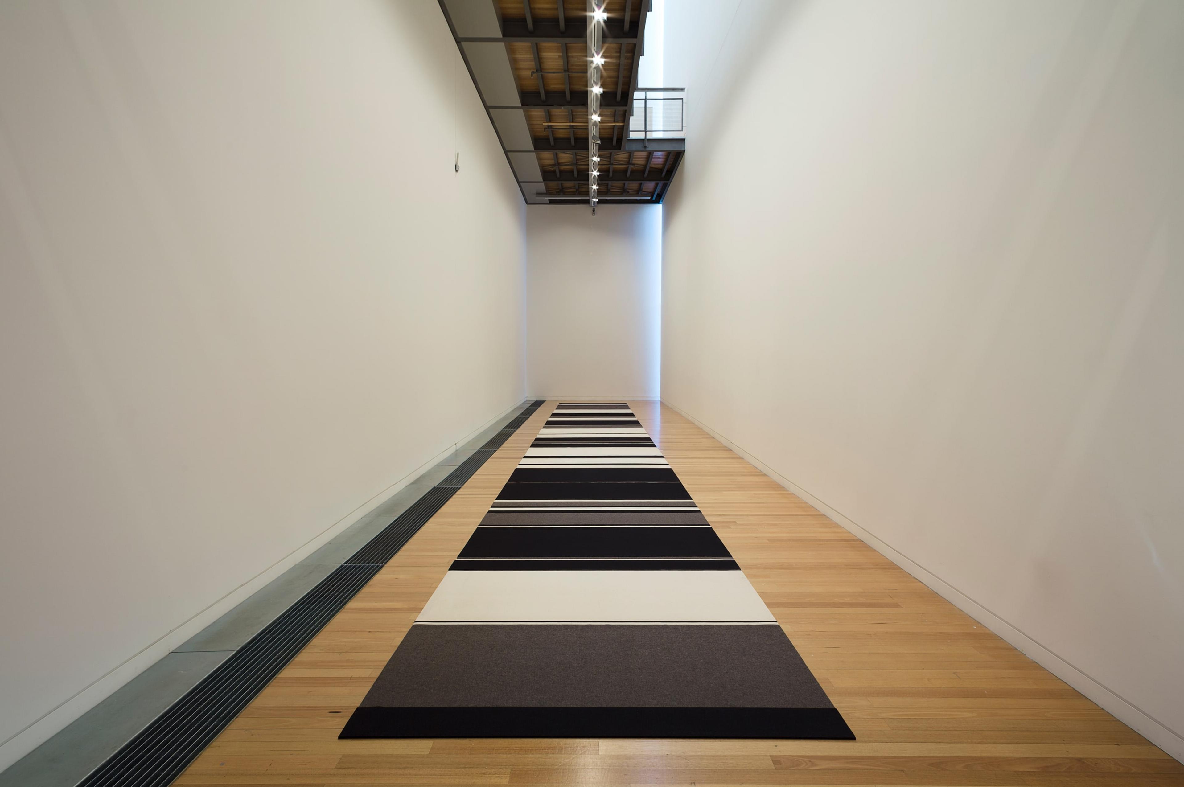 Peter Robinson, Cuts and Junctures, 2013, cut wool felt, installation dimensions variable, at the Adam Art Gallery. Courtesy the artist and Peter McLeavey Gallery, Wellington. Photo: Shaun Waugh