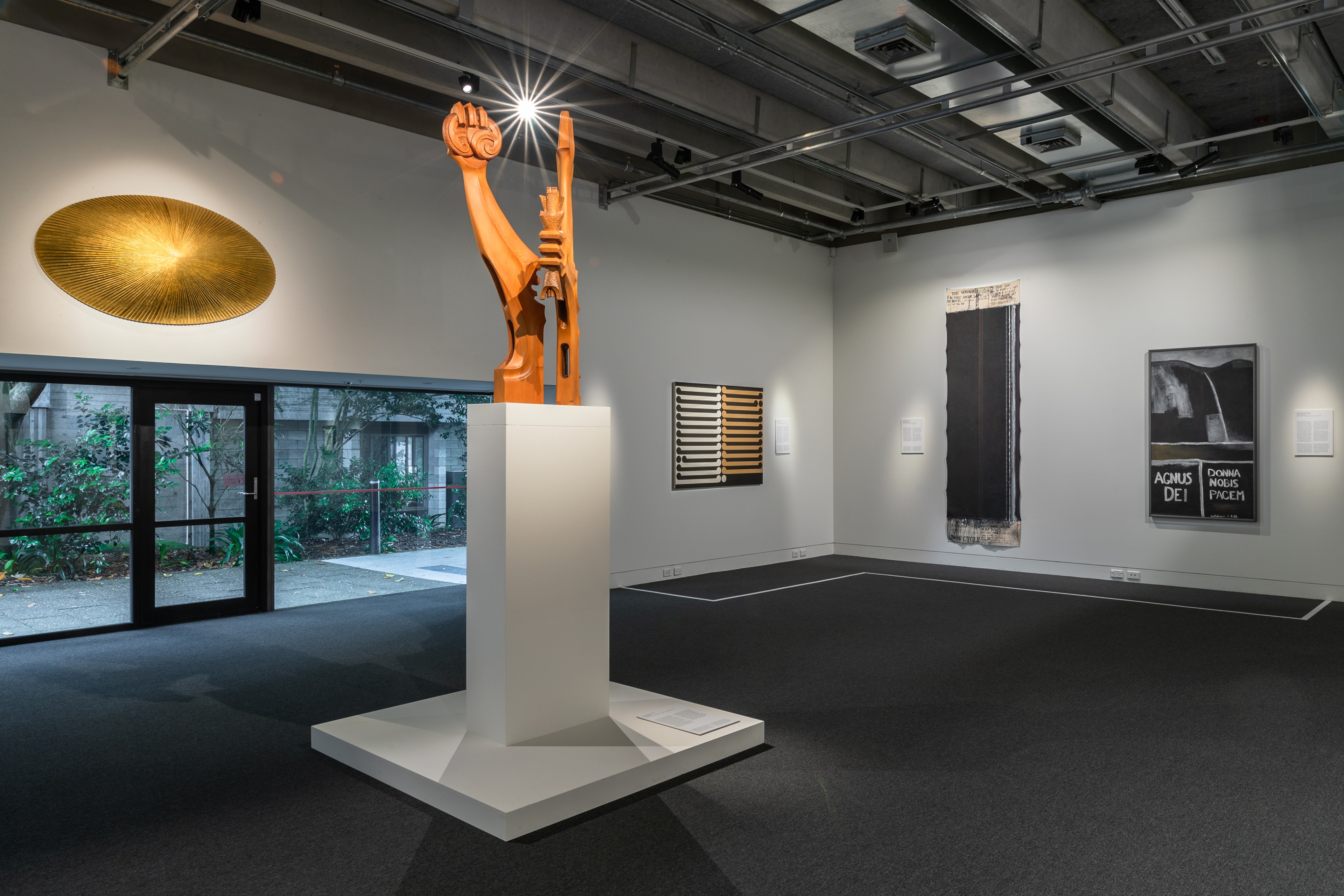 exhibition installation image, sculpture, paintings, Colin McCahon, Fred Graham, Gordon Walters, Ralph Hotere, Brett Graham