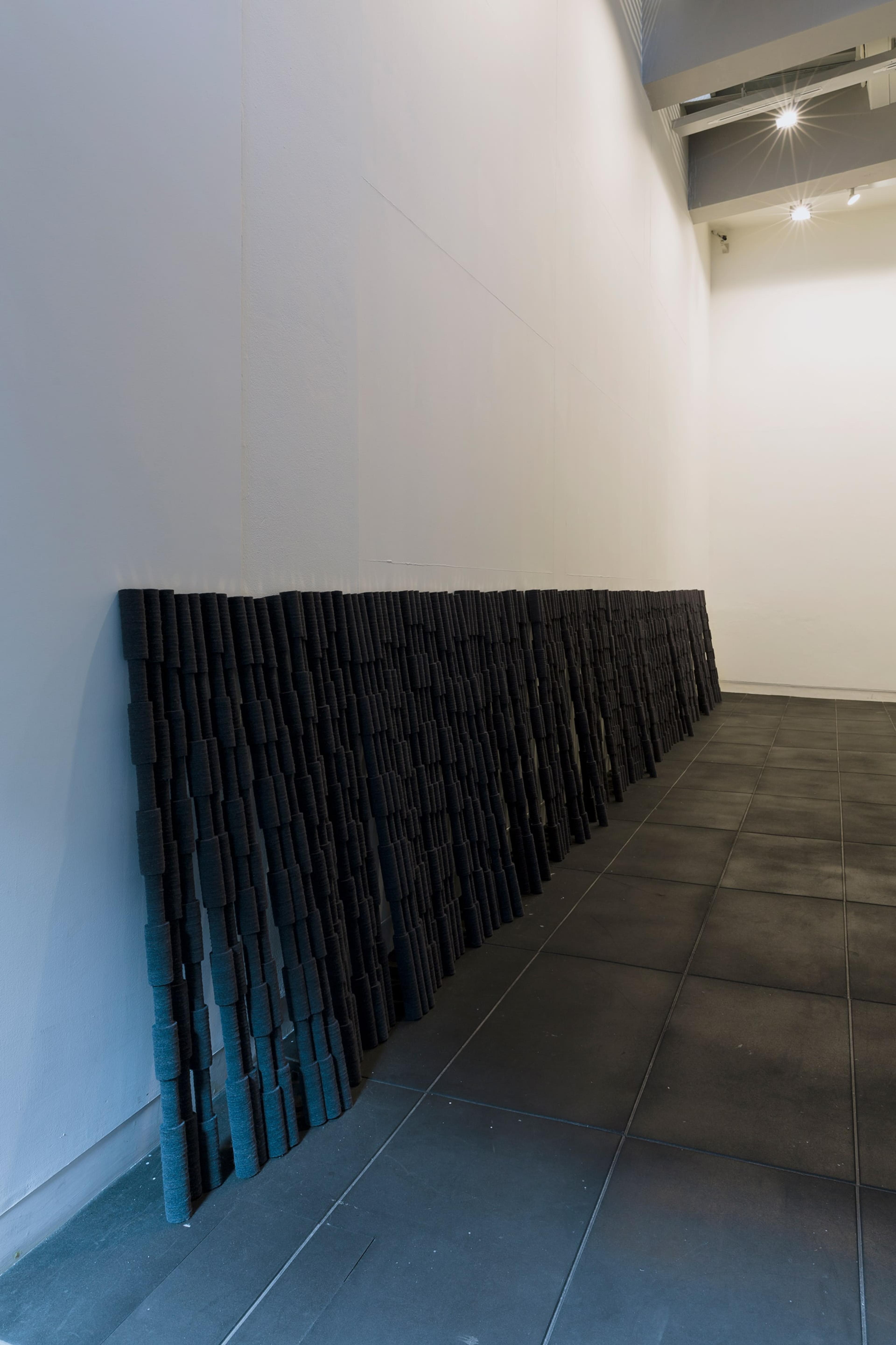 Installation view of Peter Robinson, Cuts and Junctures, 2013, cut wool felt, aluminum, installation dimensions variable, at the Adam Art Gallery. Courtesy the artist and Peter McLeavey Gallery, Wellington. Photo: Shaun Waugh.