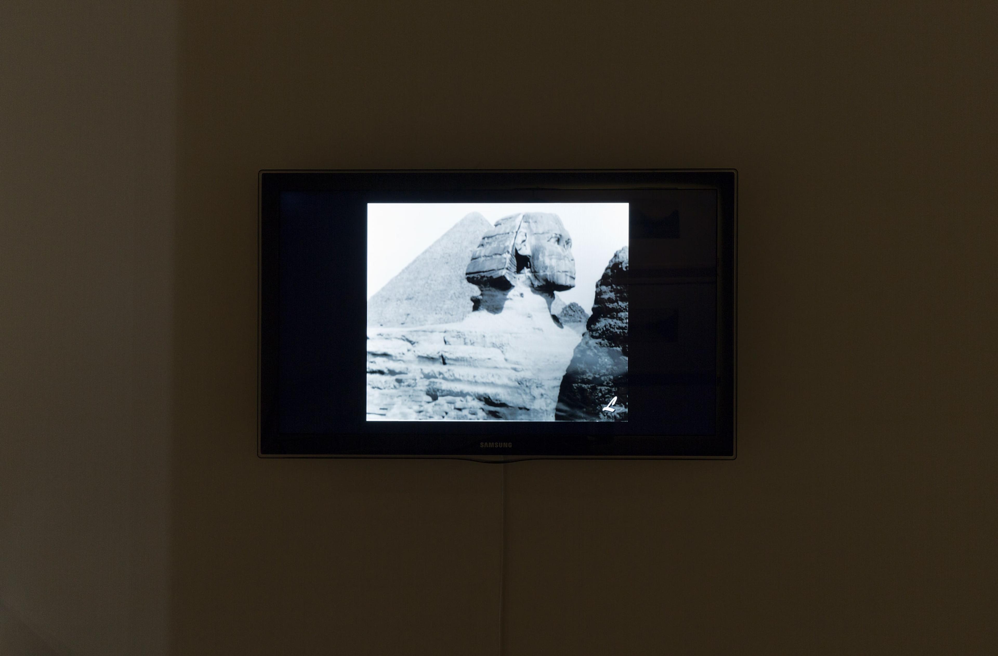 Lumière Company, installation view of Les Pyramides (vue générale) (The Pyramids [General View]), 1897. Camera Operator: Alexandre Promio, Location: Giza, Egypt. 47secs. Early 35mm transferred to digital video, b&w, silent. Courtesy of the Institut Lumière, Lyon. Photo: Shaun Waugh