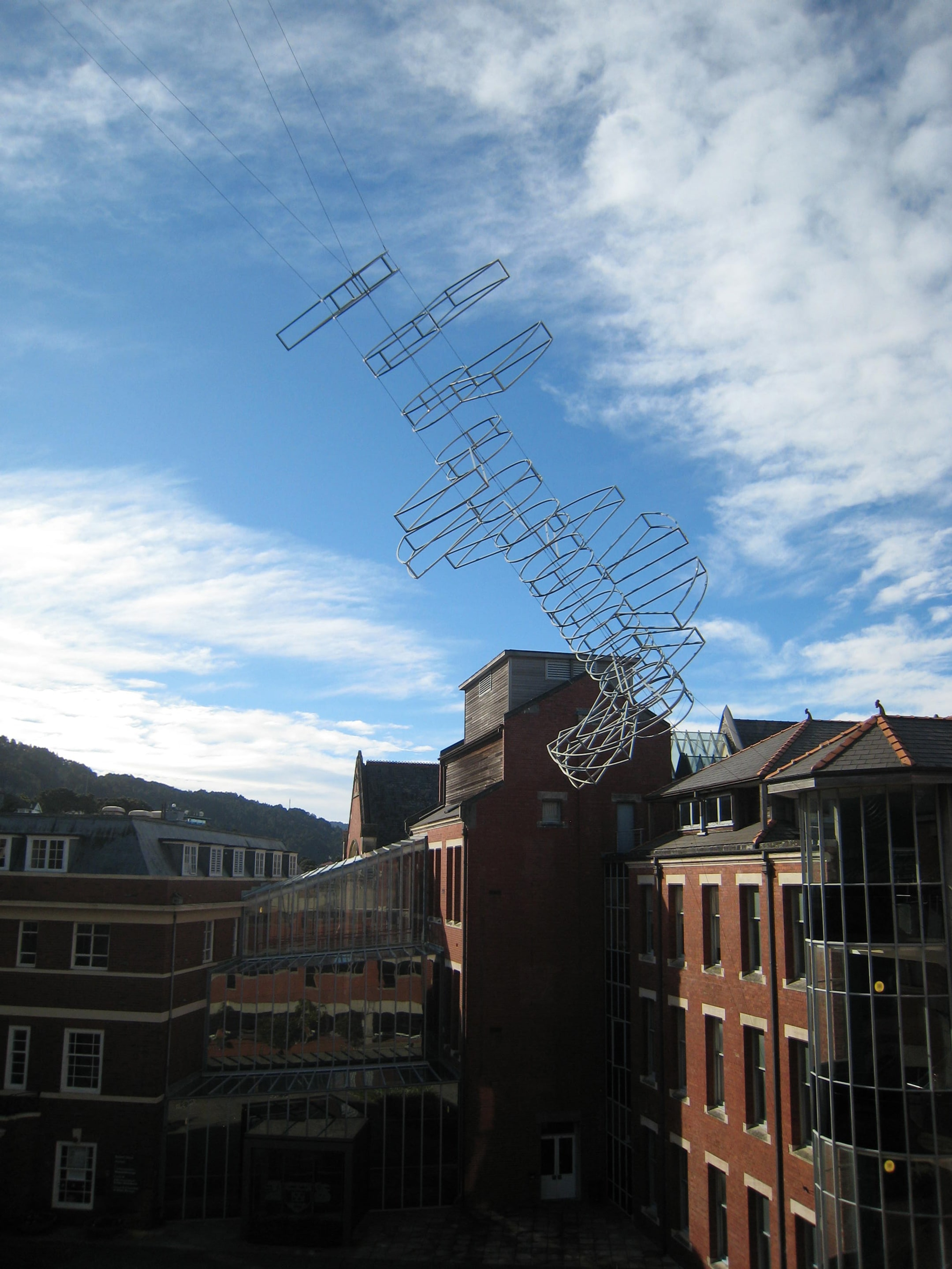 Neil Dawson, Flying Steps, 2000, painted aluminum, stainless steel cables and fittings, Victoria University of Wellington Art Collection, Gift of Sir Roderick and Gillian, Lady Deane, decommissioned 2013