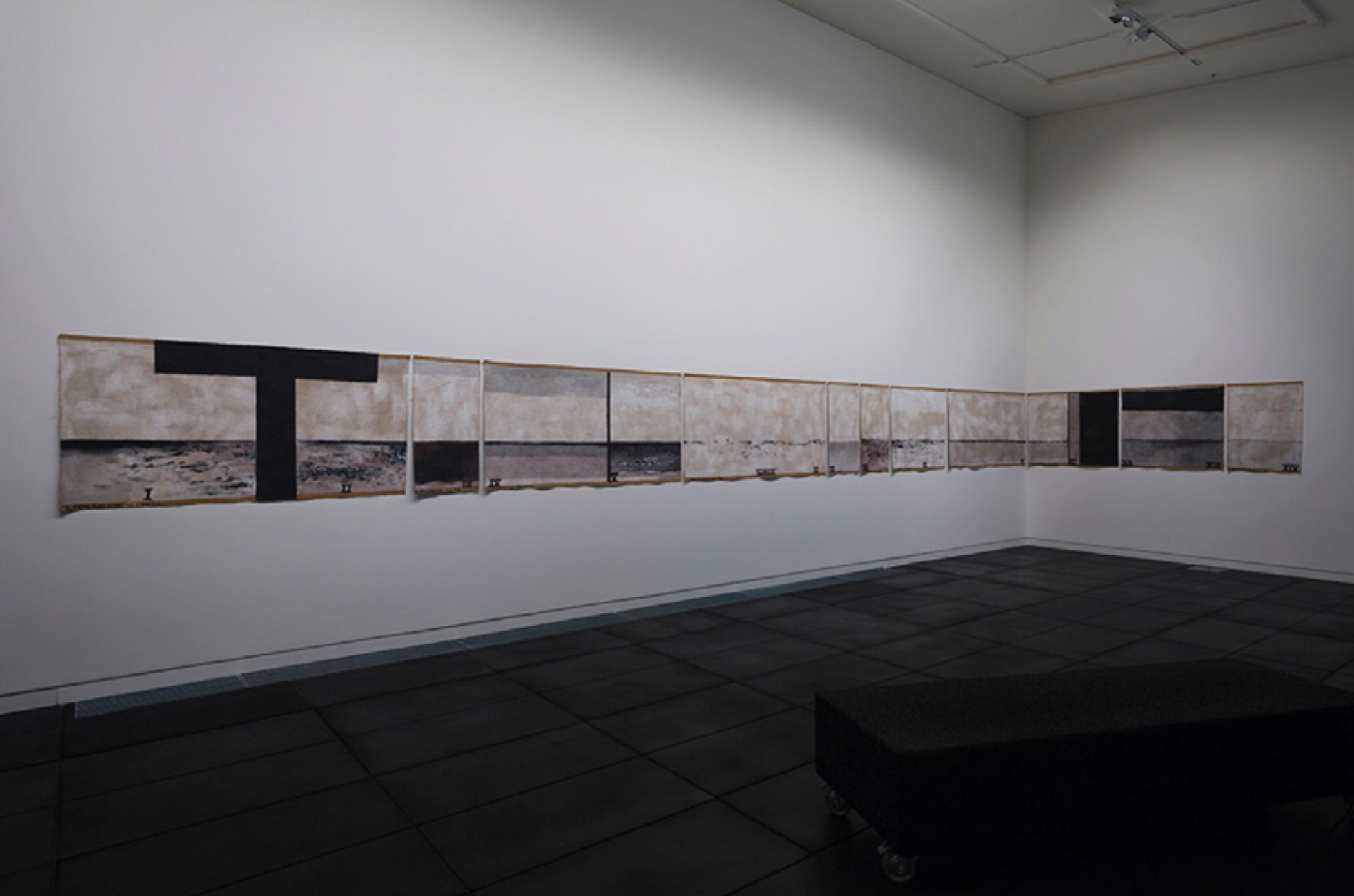 Installation view, The Specious Present, Adam Art Gallery Te Pātaka Toi, Victoria University of Wellington, 11 July–20 September 2015. Colin McCahon, Walk (Series C), 1973, synthetic polymer paint on unstretched jute canvas, 11 panels. Photo by Shaun Waugh. Te Papa (2004-0017-1/A-K to K-K)