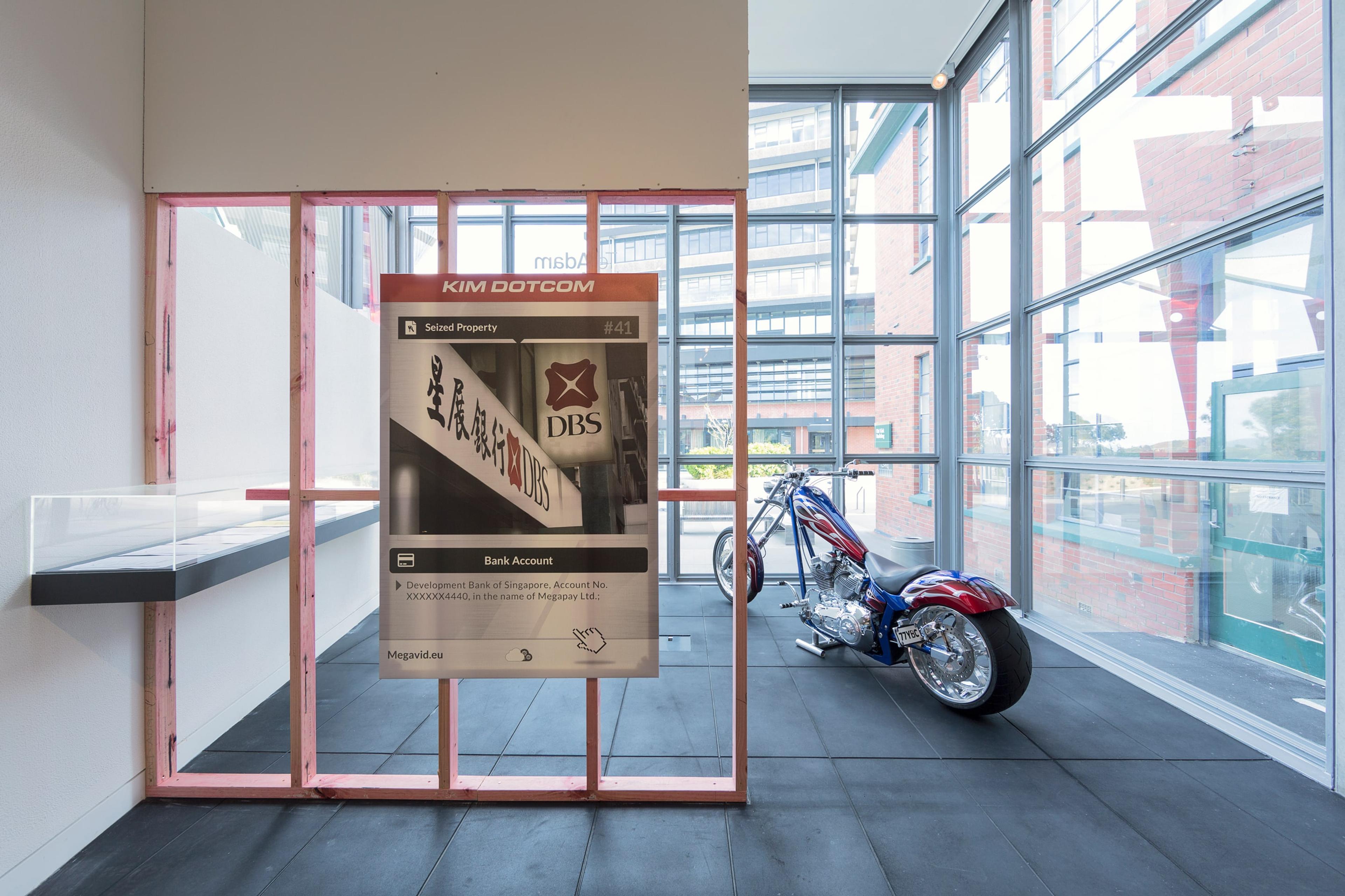 Simon Denny, The Personal Effects of Kim Dotcom 2014, installation view at the Adam Art Gallery, Victoria University of Wellington ©Simon Denny (photo: Shaun Waugh).