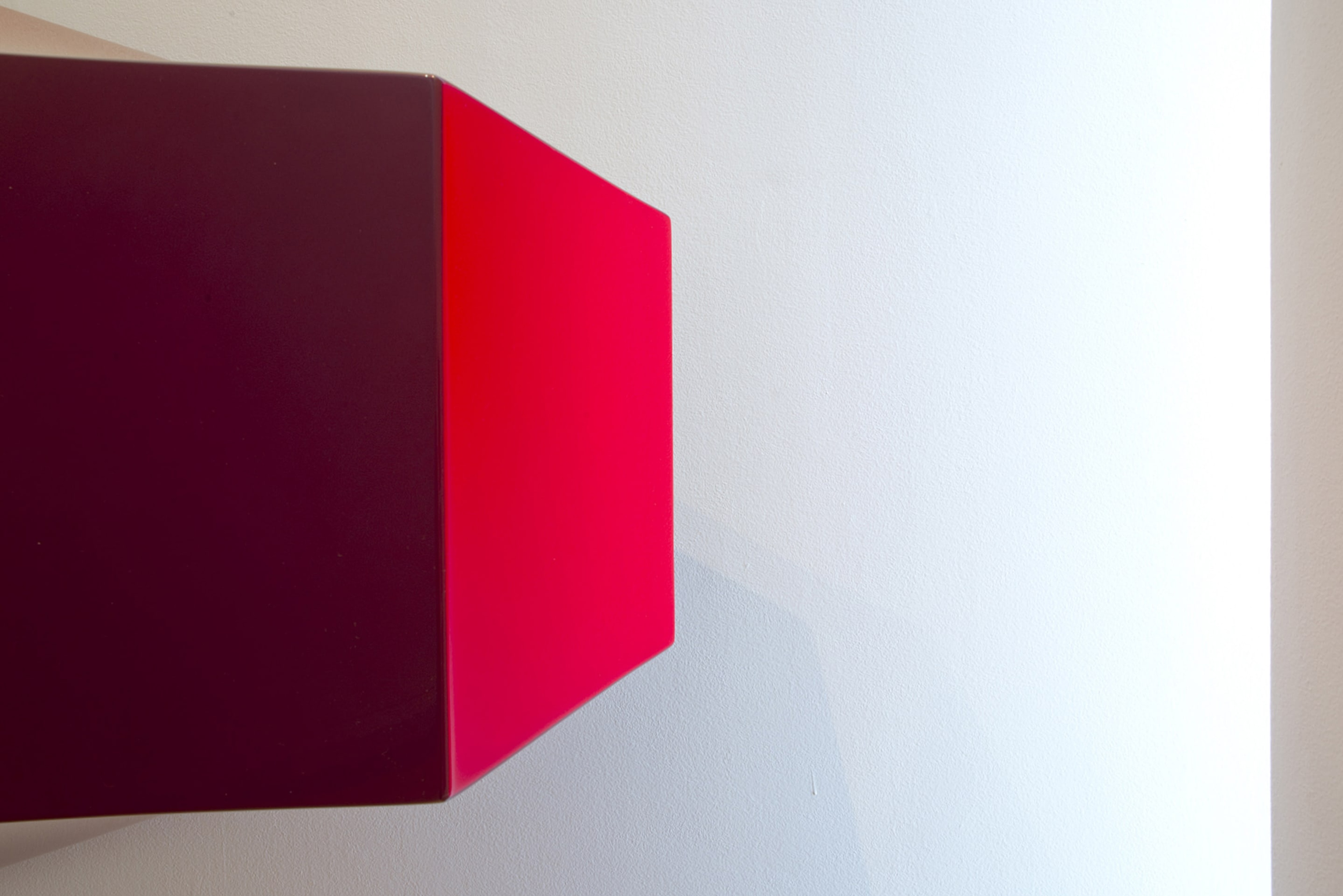 Sarah Munro, Surface Detail – Gloss Red, 2012, automotive paint over custom made fibreglass support. Courtesy of Page Blackie Gallery, Wellington, on view in Acting Out at Adam Art Gallery Te Pātaka Toi, photo: Shaun Matthews