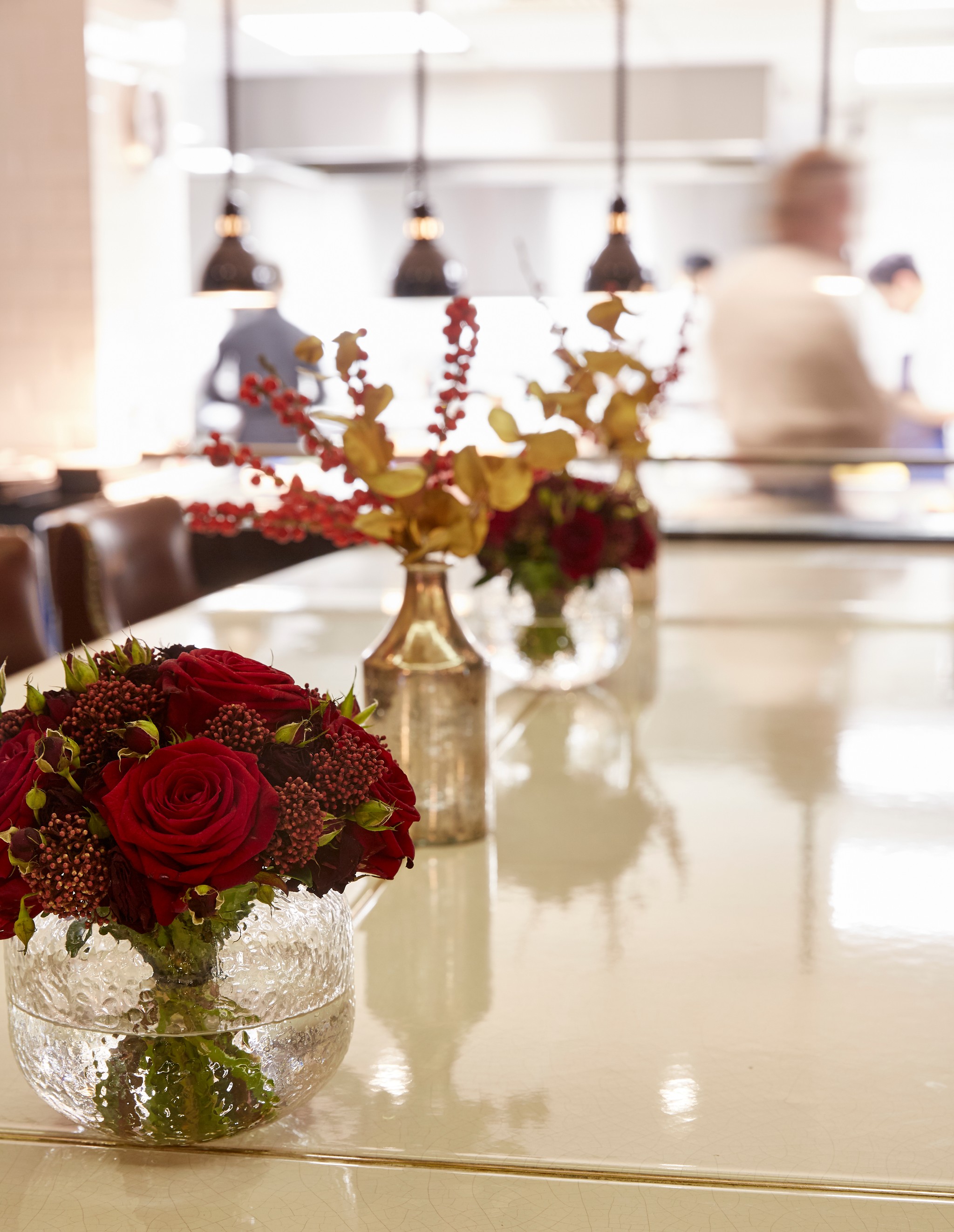 Red flowers on the chef's table at Marcus Belgravia