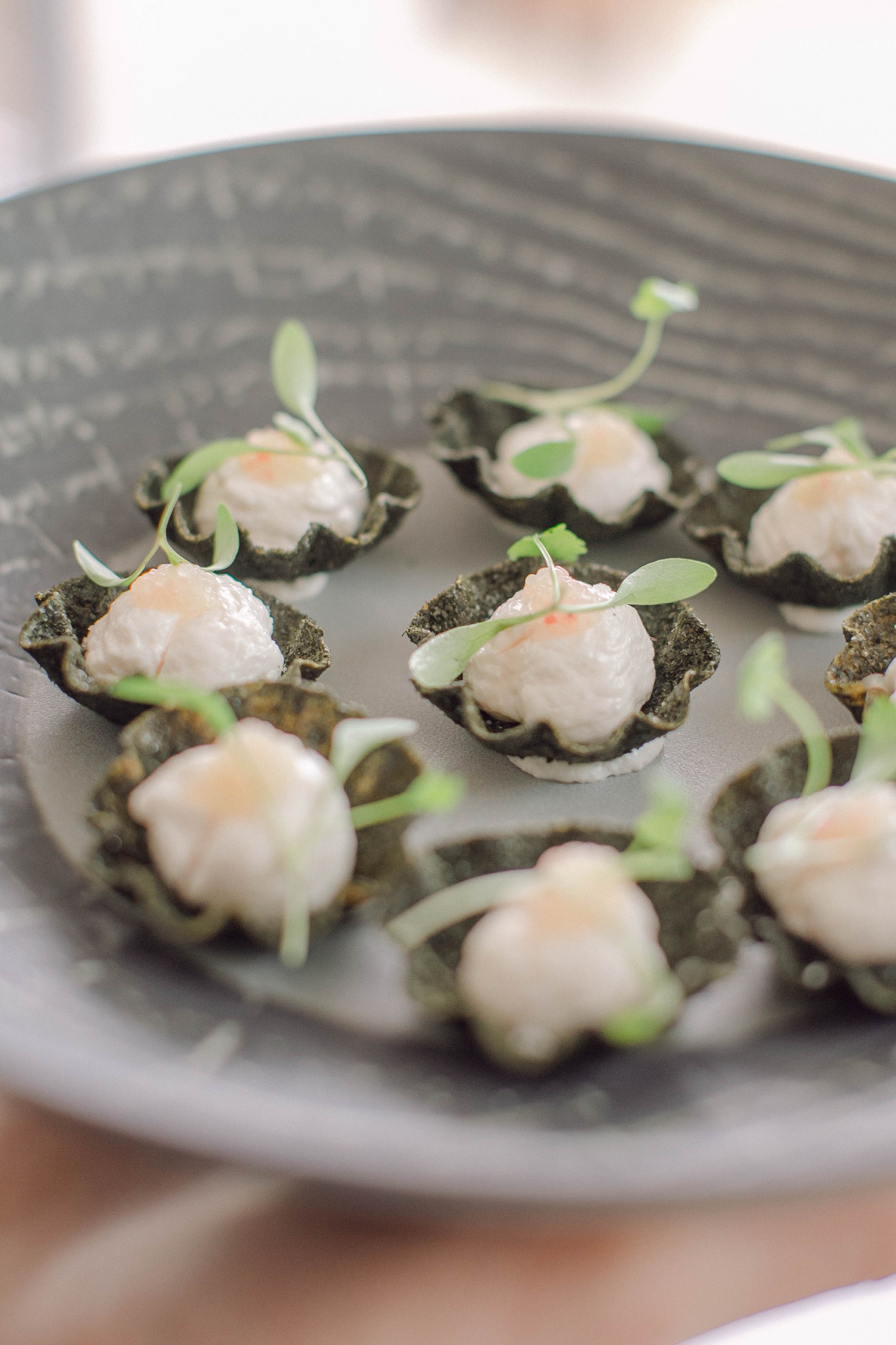 Canapes in a bowl at a private event catered by Marcus Belgravia