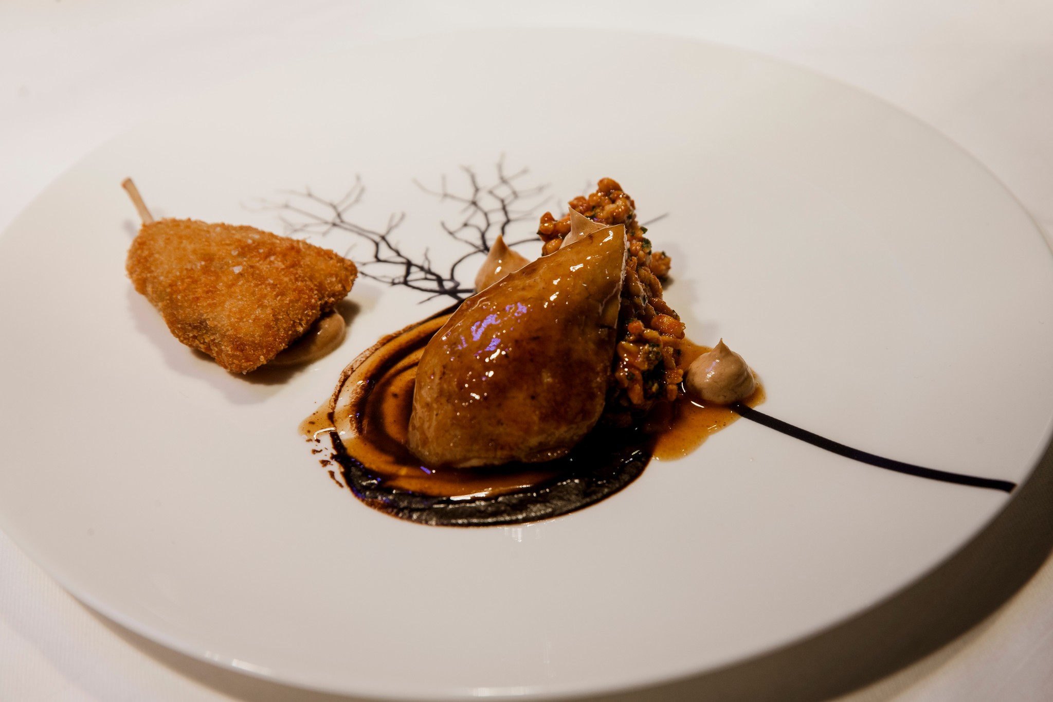 Roast and Marinated Breast of Quail Crispy Leg, Carrot & Rosehip, Black Garlic and pine nut from Marcus Wareing's menu at Signature Food Festival 
